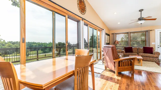 a living room with large windows