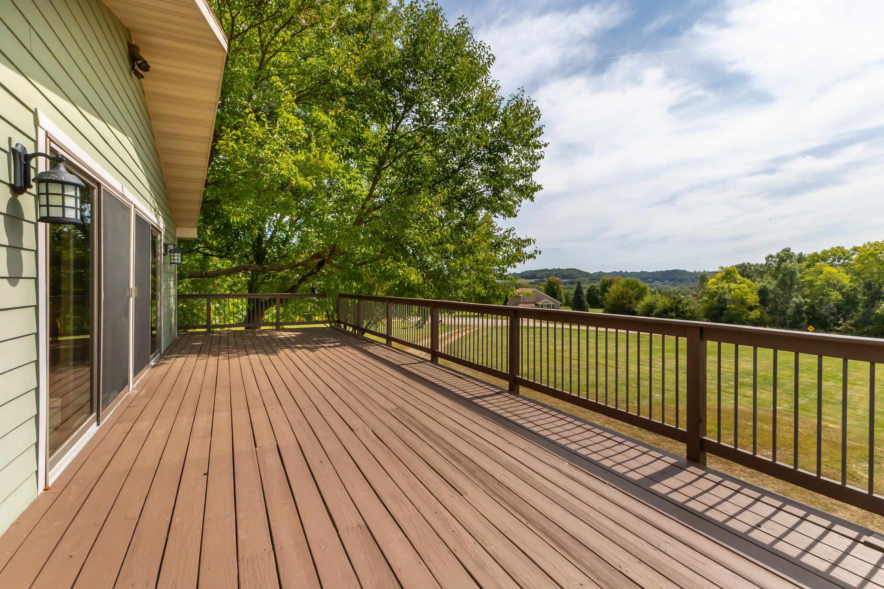 2 Sunbow Path Galena, IL 61036 - Photo 15 of 37 a view of balcony with wooden floor and fence