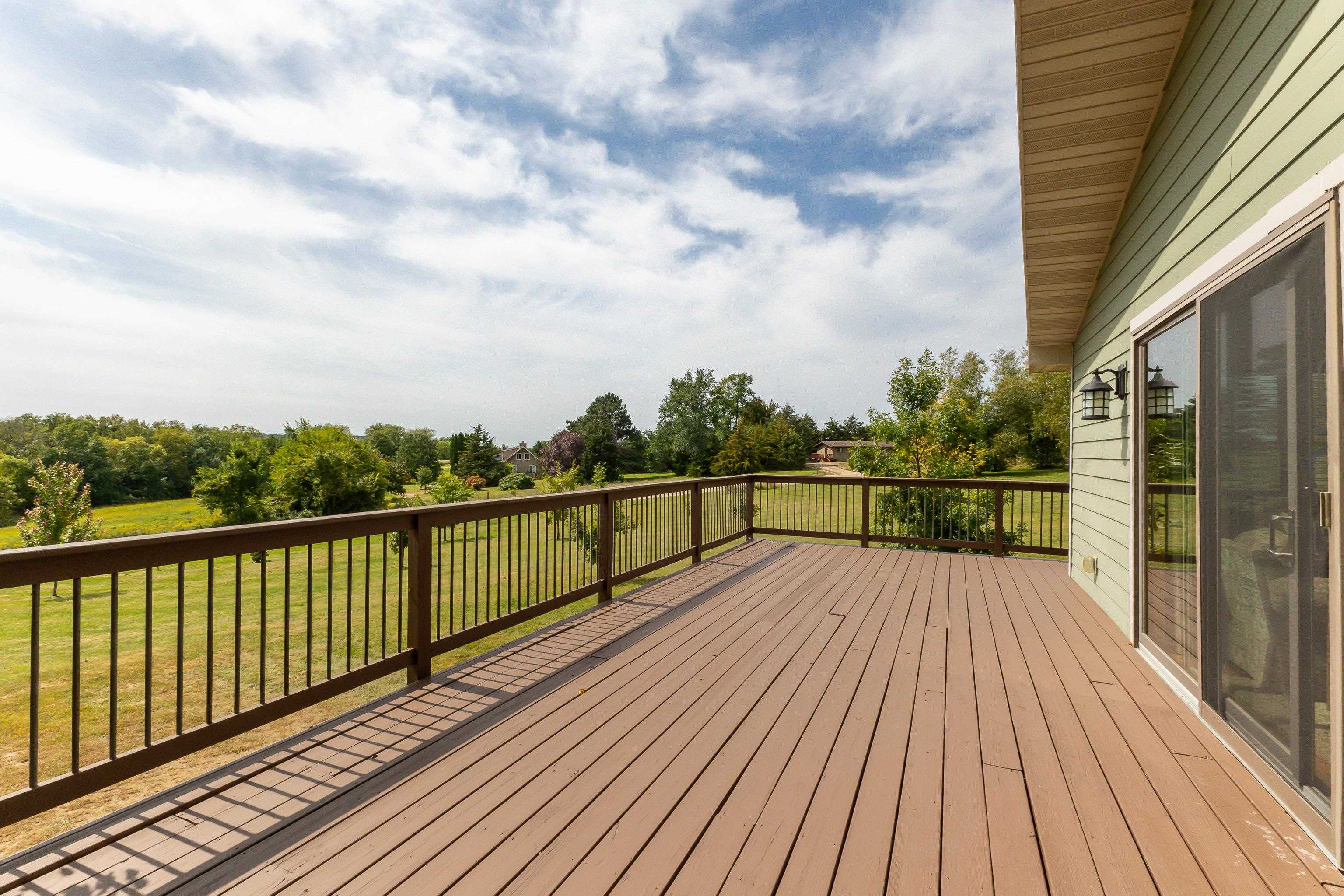 2 Sunbow Path Galena, IL 61036 - Photo 16 of 37 a view of balcony with wooden floor
