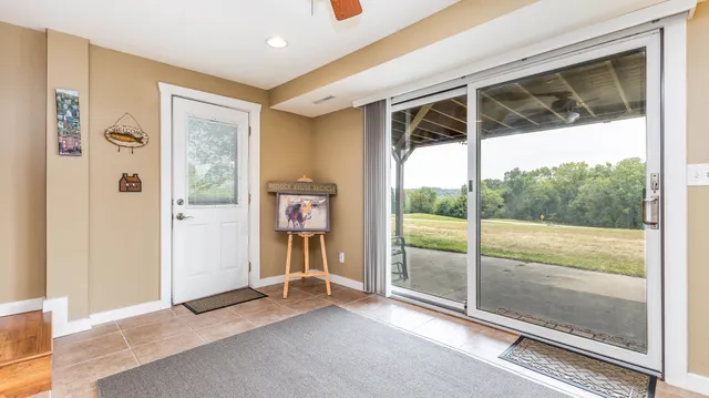 a view of entryway with stairs and a couch