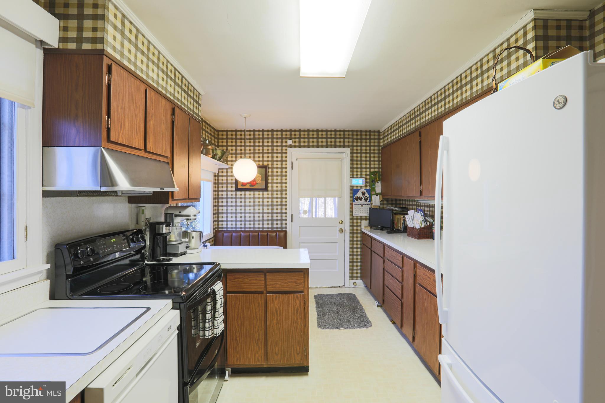 2606 Old Court Road Baltimore, MD 21208 - Photo 16 of 59 Kitchen with door to screened porch