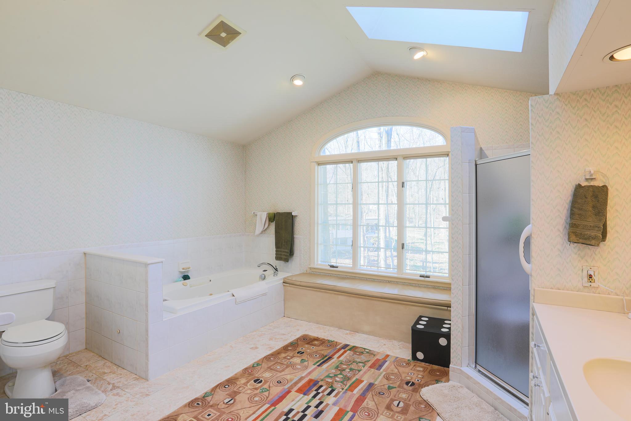 2606 Old Court Road Baltimore, MD 21208 - Photo 19 of 59 Jetted tub, stall shower, and window seat