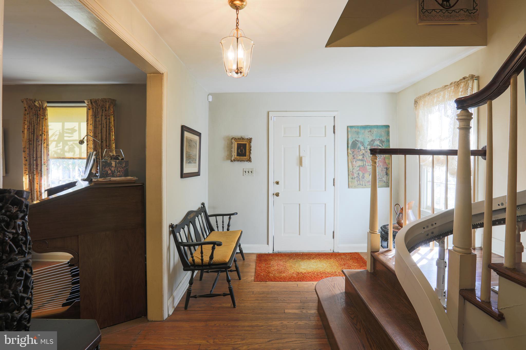 Inviting foyer says "welcome home"