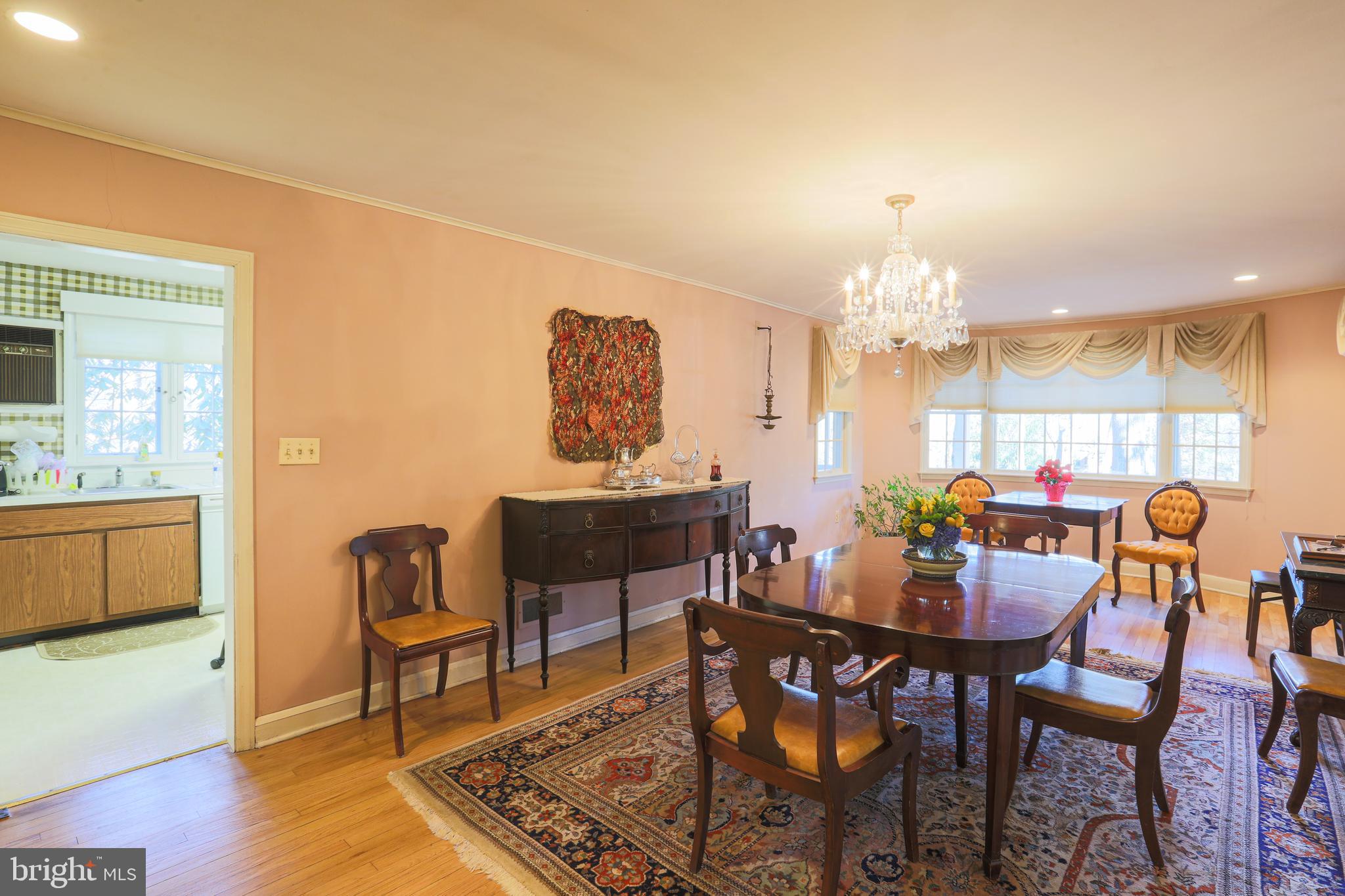 2606 Old Court Road Baltimore, MD 21208 - Photo 8 of 59 Formal dining room with swing door from kitchen