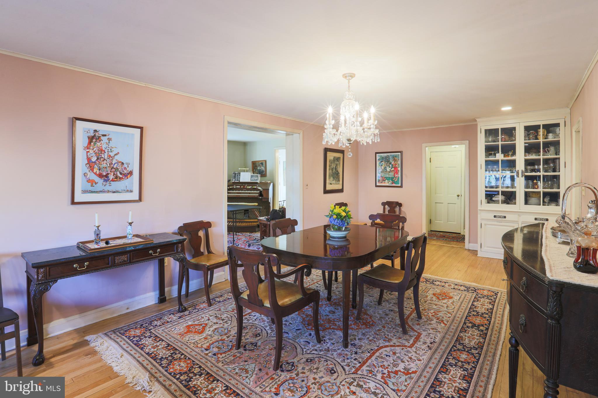 2606 Old Court Road Baltimore, MD 21208 - Photo 10 of 59 Chandelier and wood floors