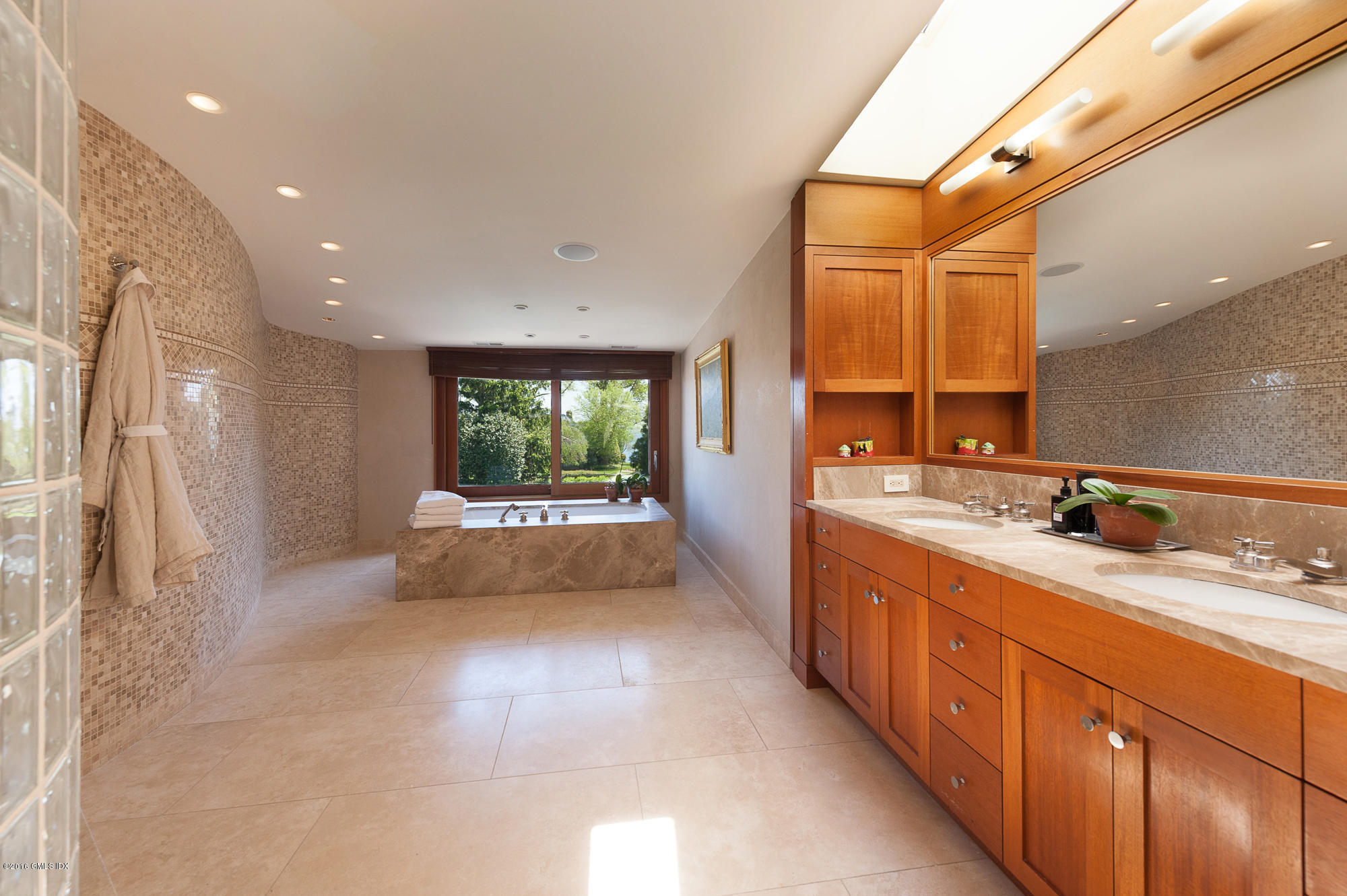 2 Seagate Road Riverside, CT 06878 - Photo 19 of 38 a spacious bathroom with a double vanity sink a mirror and a shower