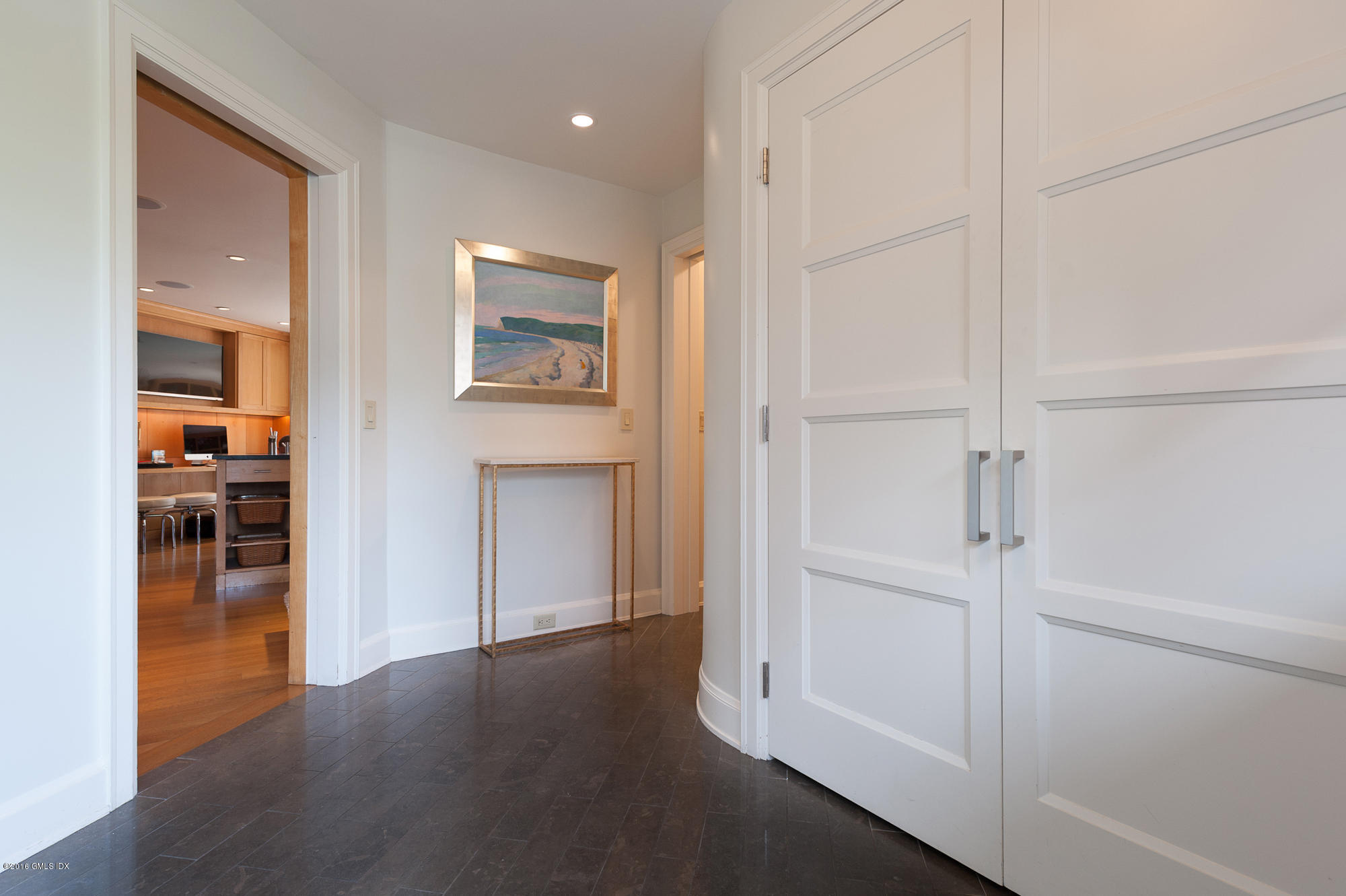2 Seagate Road Riverside, CT 06878 - Photo 20 of 38 a view of a hallway with wooden floor and closet