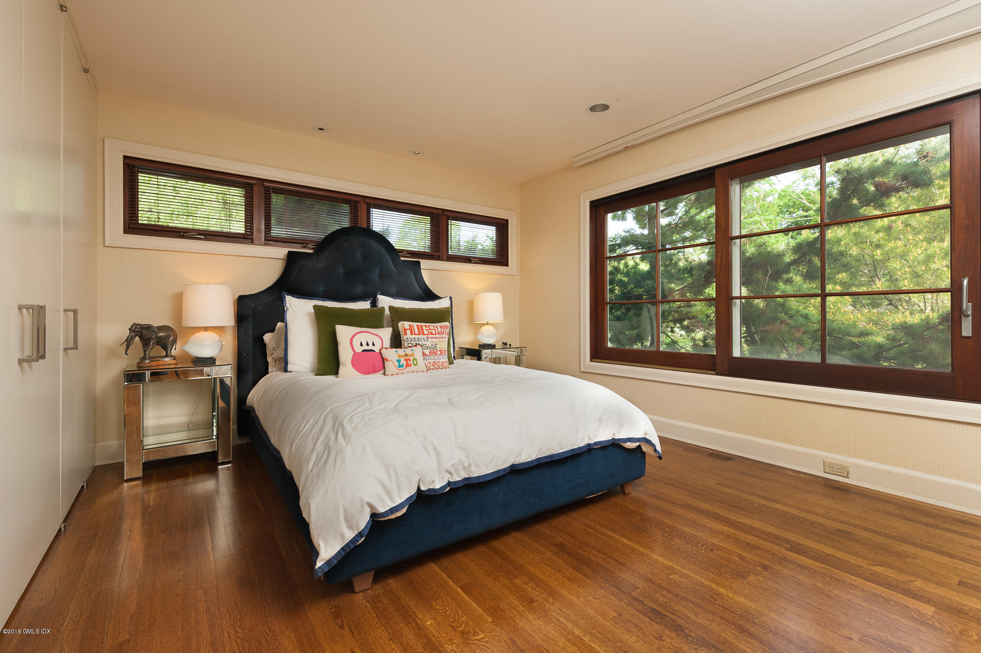 2 Seagate Road Riverside, CT 06878 - Photo 21 of 38 a bedroom with a bed and window