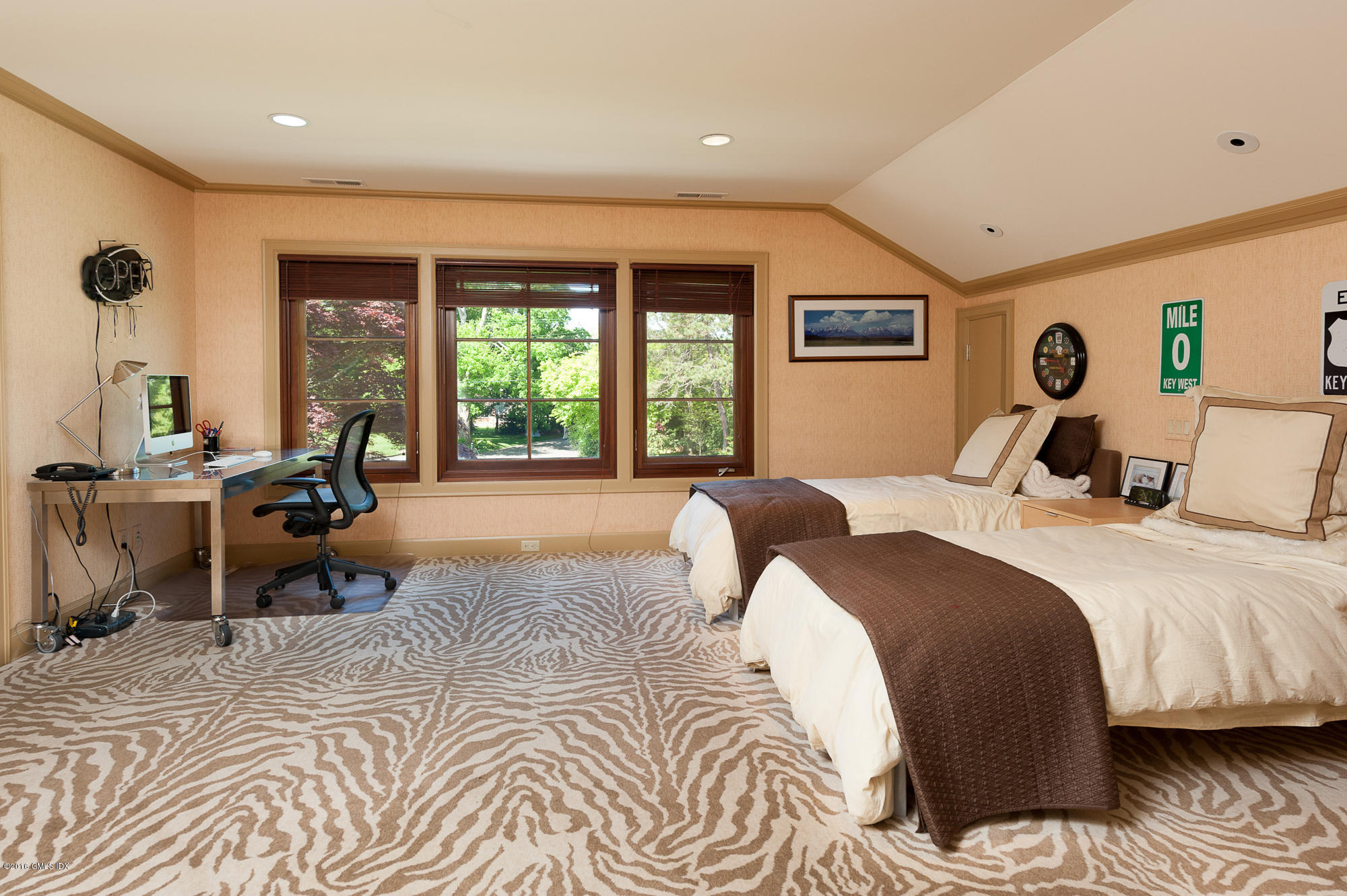 2 Seagate Road Riverside, CT 06878 - Photo 23 of 38 a bedroom with a bed and a large window