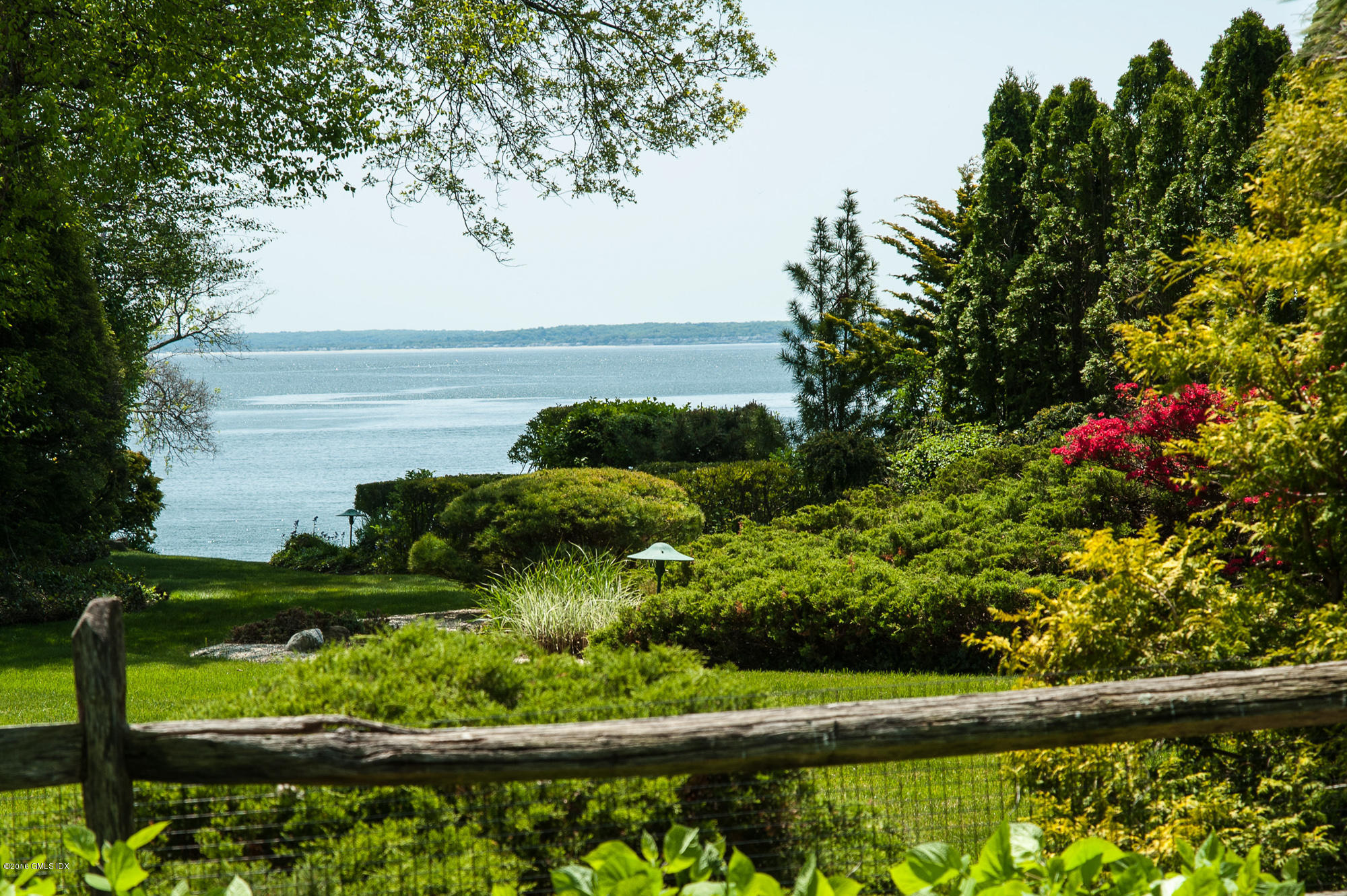 2 Seagate Road Riverside, CT 06878 - Photo 27 of 38 a view of a garden with a lake