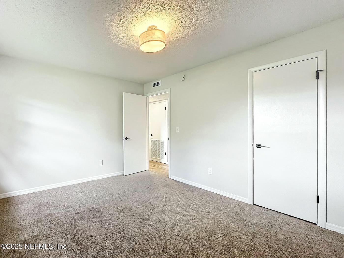 8735 Moss Haven Road Jacksonville, FL 32221 - Photo 24 of 29 a view of an empty room