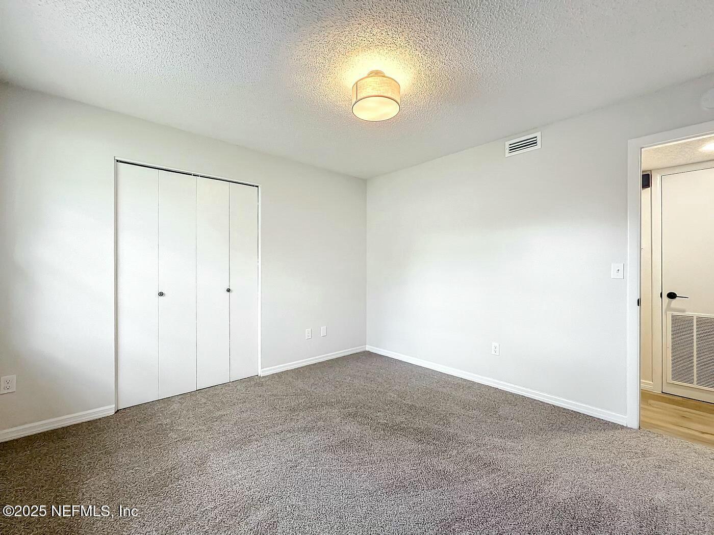 8735 Moss Haven Road Jacksonville, FL 32221 - Photo 25 of 29 a view of an empty room