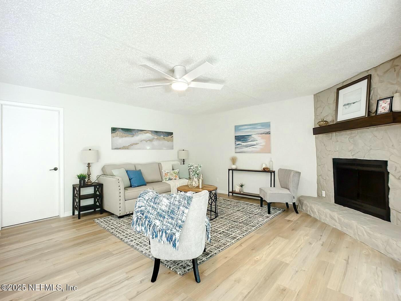 8735 Moss Haven Road Jacksonville, FL 32221 - Photo 10 of 29 a living room with furniture