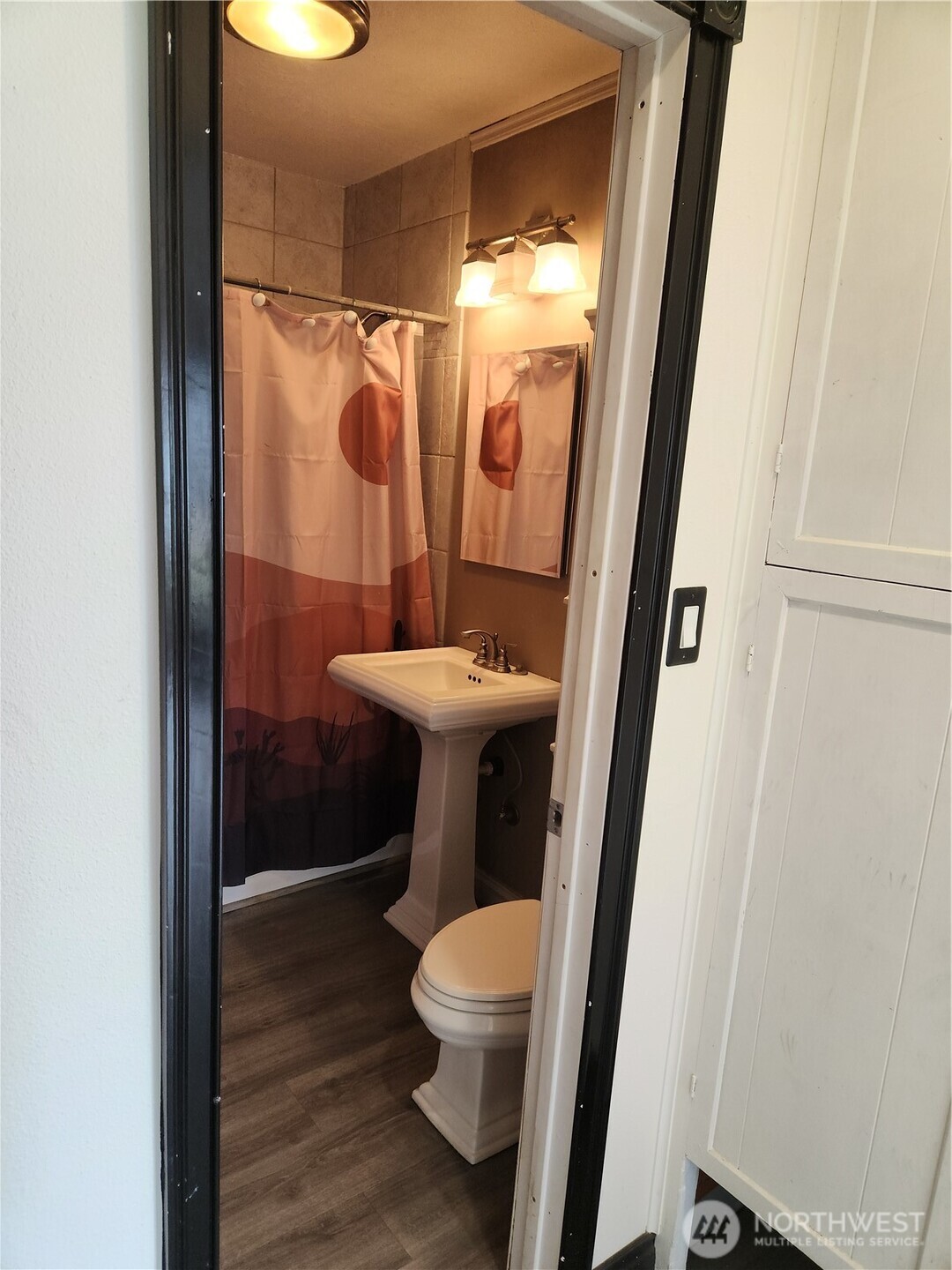 2902 Dover Street Longview, WA 98632 - Photo 17 of 23 a bathroom with a sink and a toilet