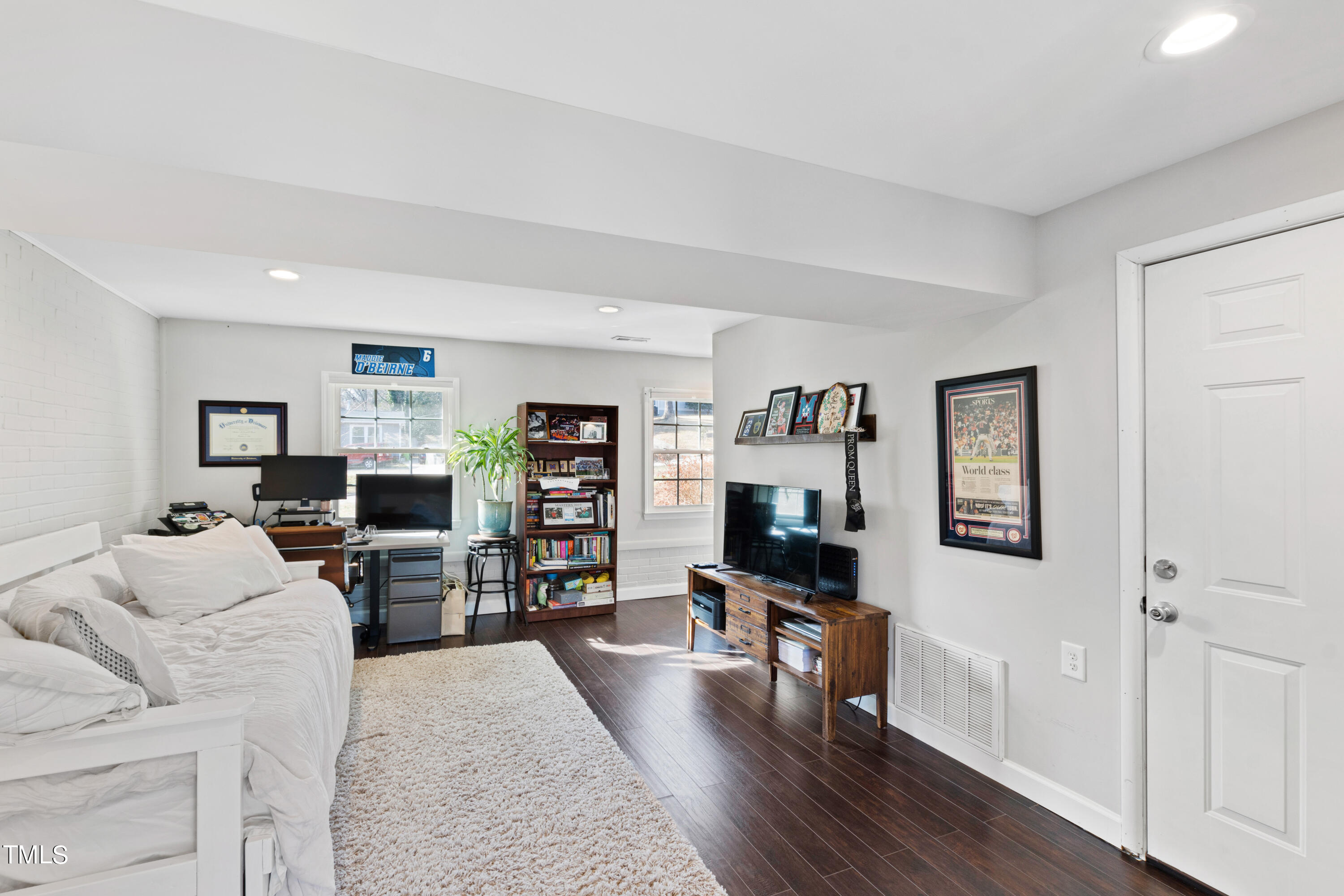2413 Kennington Road Raleigh, NC 27610 - Photo 25 of 33 a living room with furniture and a wooden floor