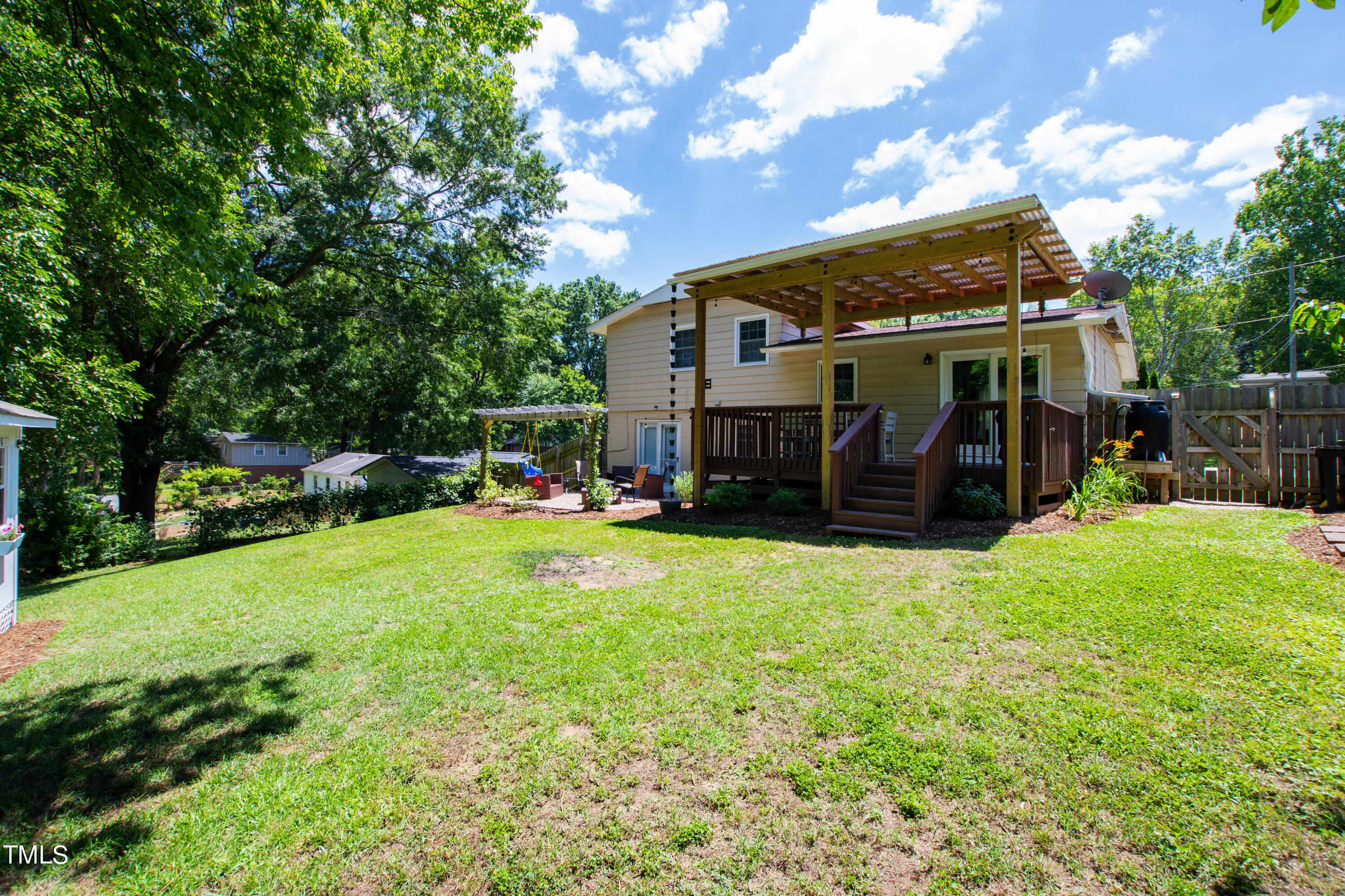 2413 Kennington Road Raleigh, NC 27610 - Photo 28 of 33 a view of a house with backyard and porch