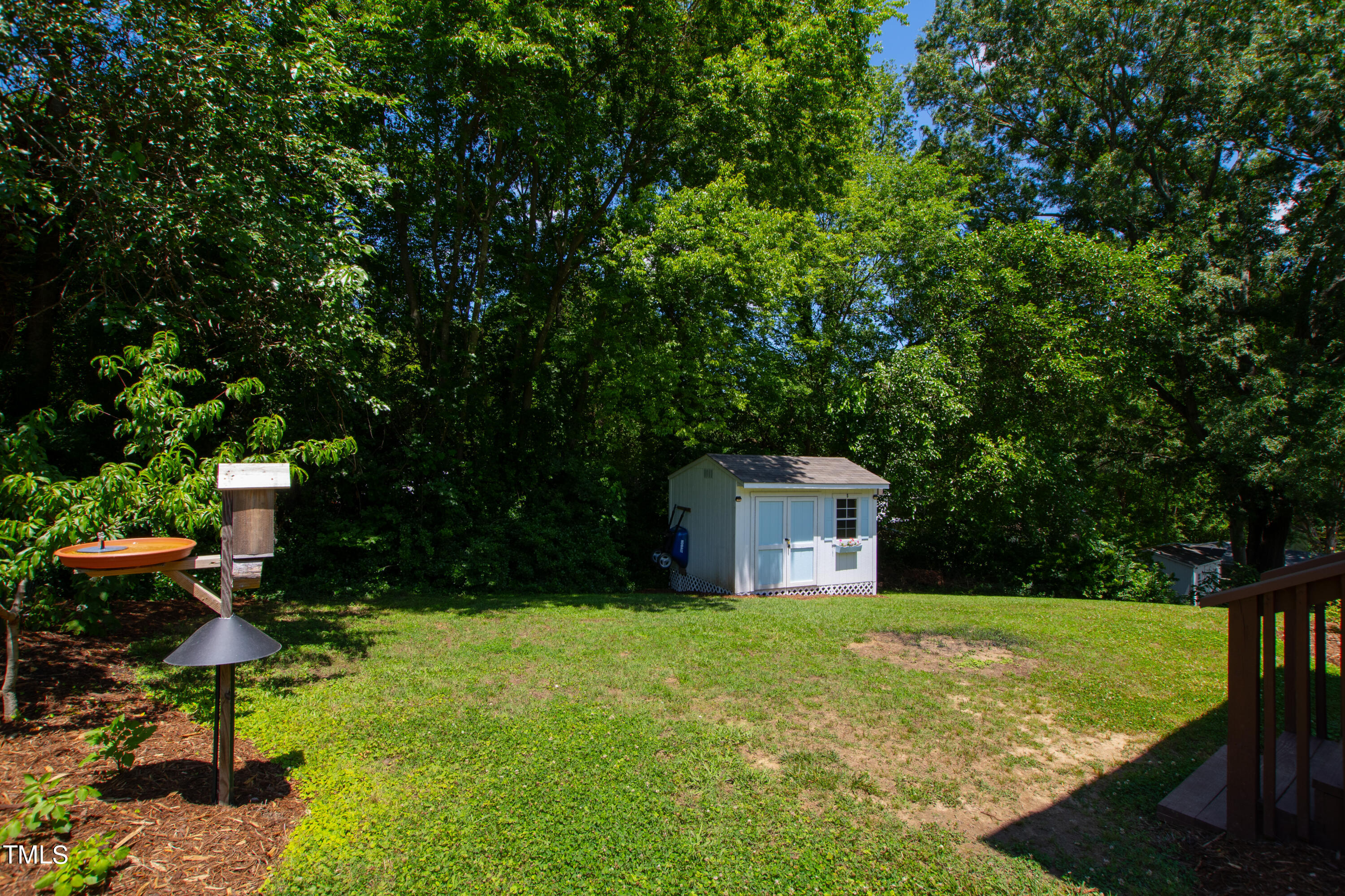 2413 Kennington Road Raleigh, NC 27610 - Photo 29 of 33 a view of a house with backyard and sitting area