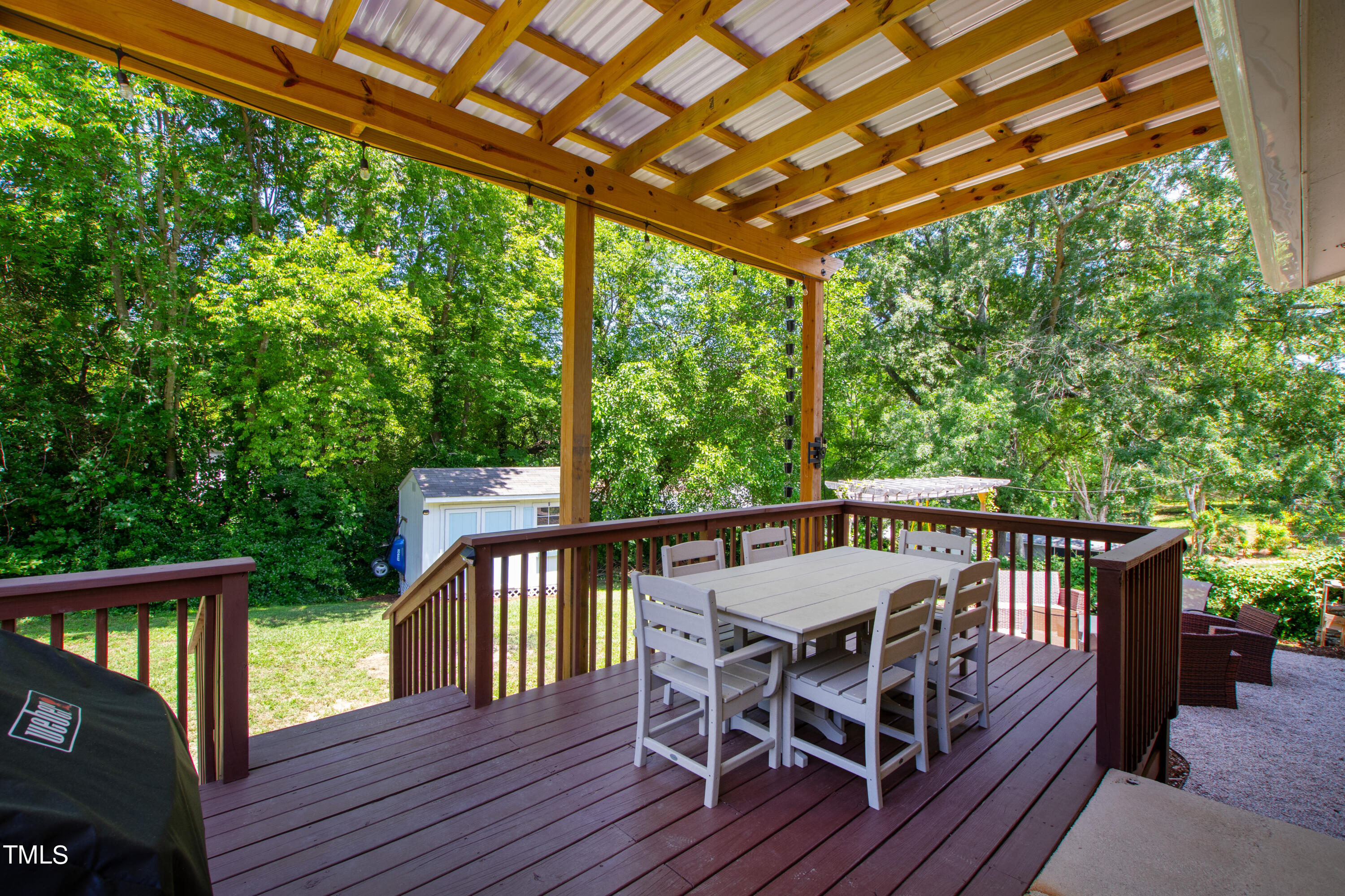 2413 Kennington Road Raleigh, NC 27610 - Photo 5 of 33 a view of a chairs on the roof deck