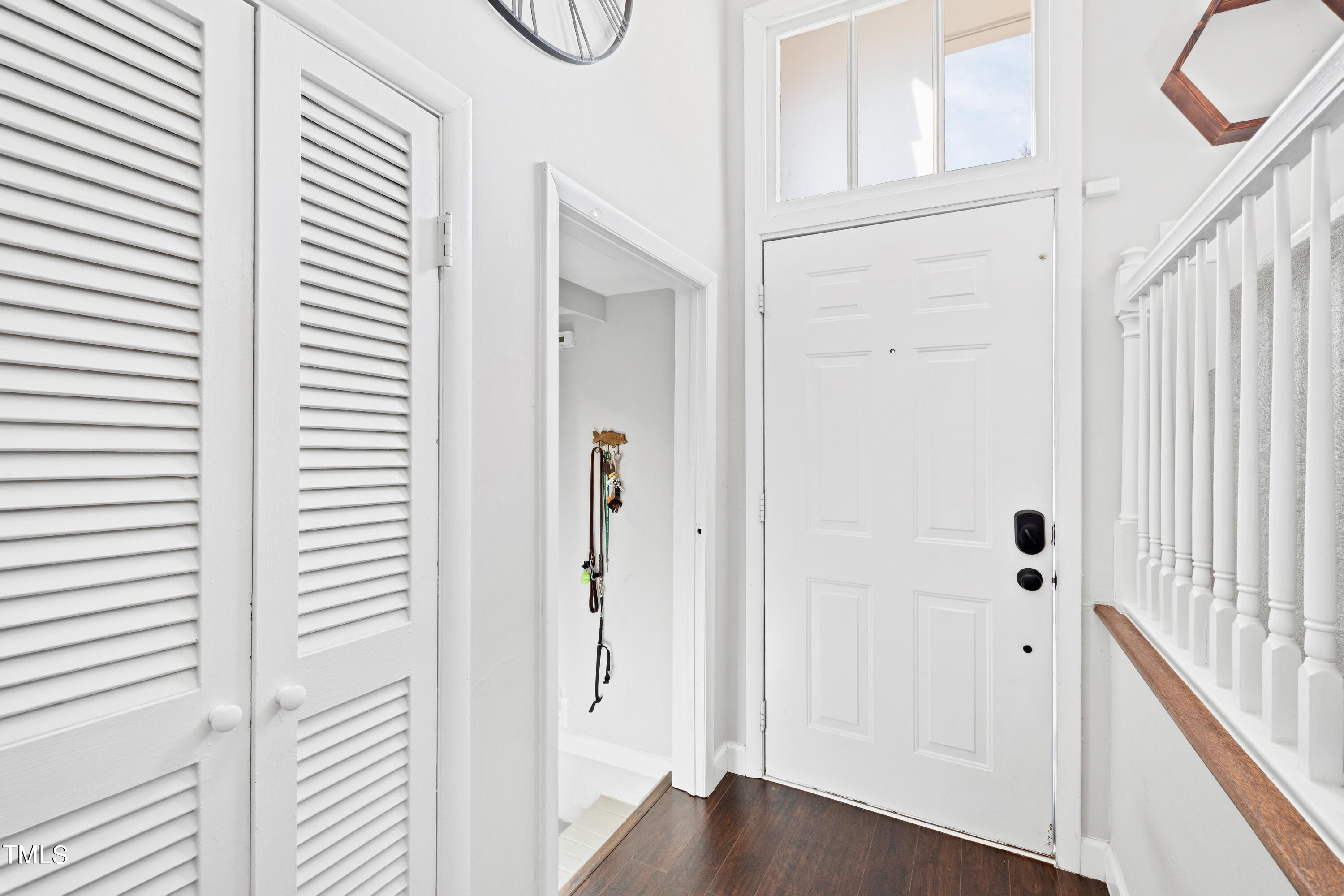 2413 Kennington Road Raleigh, NC 27610 - Photo 10 of 33 a view of a entryway with wooden floor