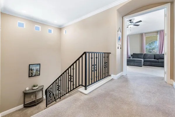 a view of a livingroom with furniture and windows