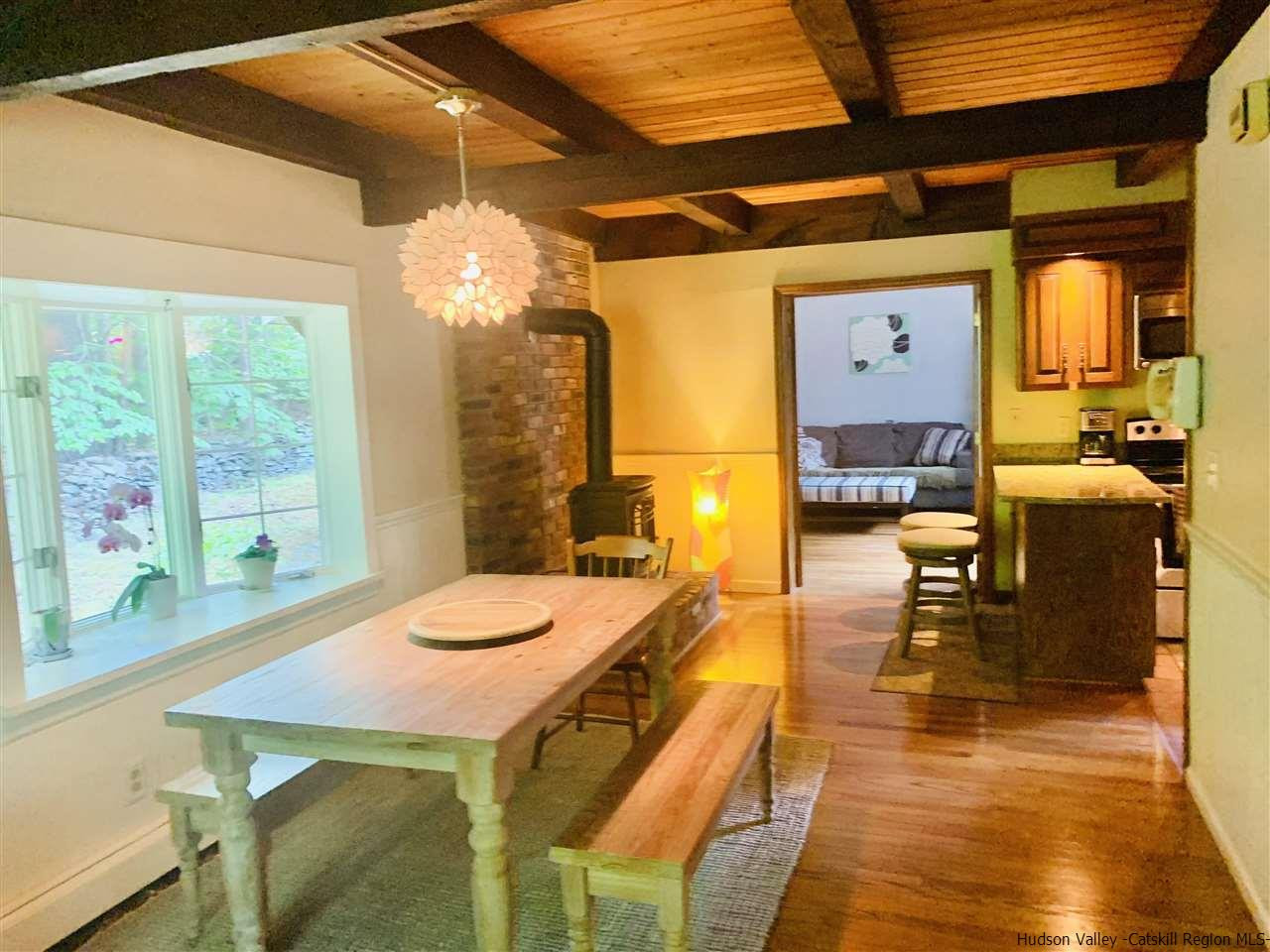 71 Brink Road Saugerties, NY 12477 - Photo 15 of 33 a dining room with a table and chairs