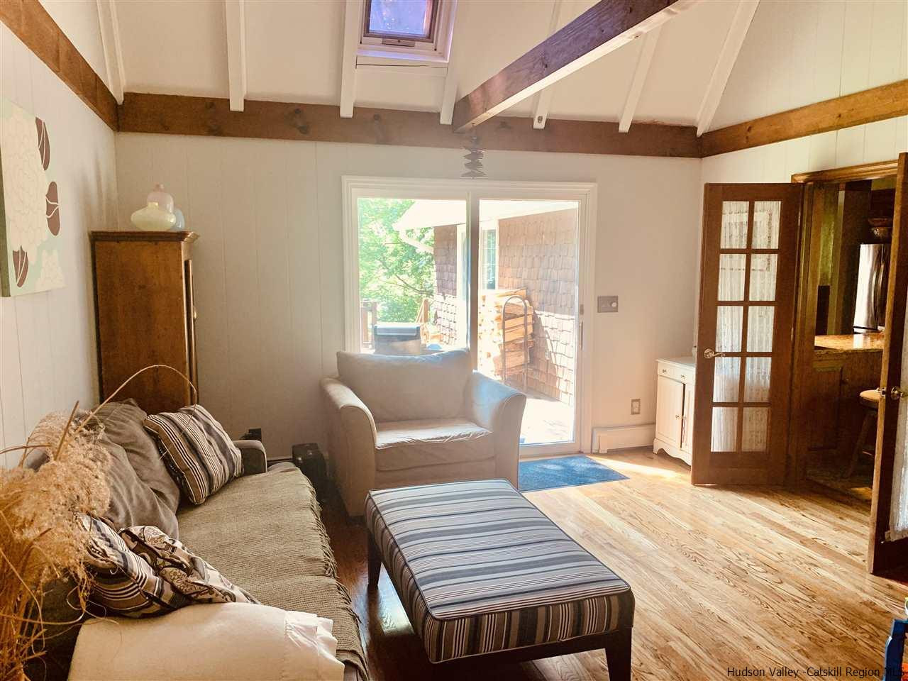 71 Brink Road Saugerties, NY 12477 - Photo 17 of 33 a bedroom with a bed and wooden floor