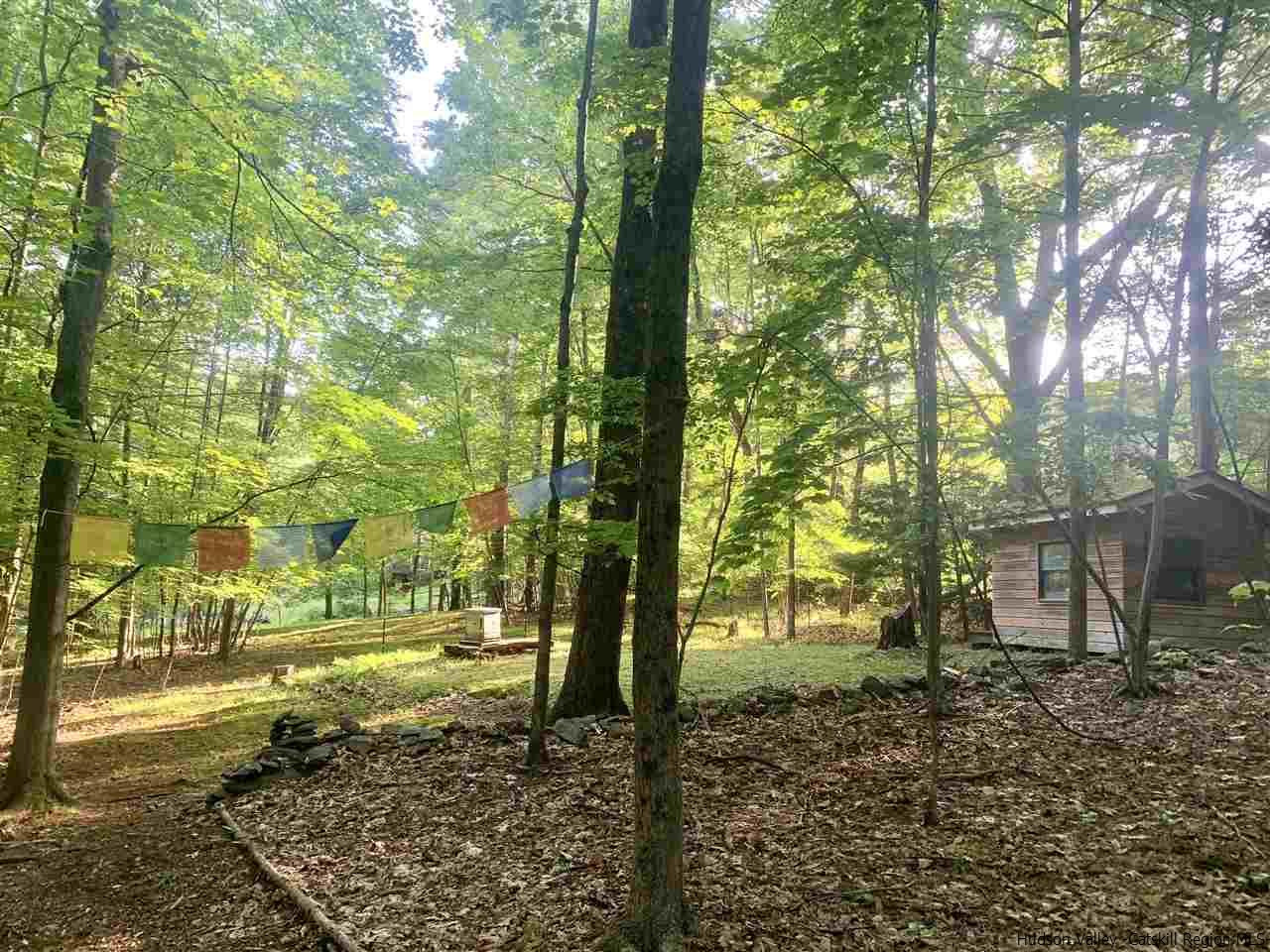 71 Brink Road Saugerties, NY 12477 - Photo 27 of 33 a backyard of a house with lots of green space