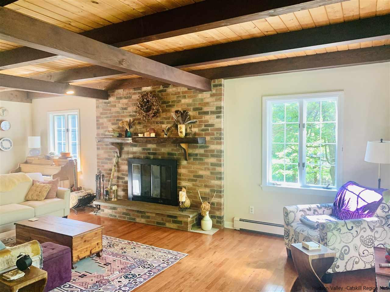 71 Brink Road Saugerties, NY 12477 - Photo 7 of 33 a living room with furniture and a fireplace