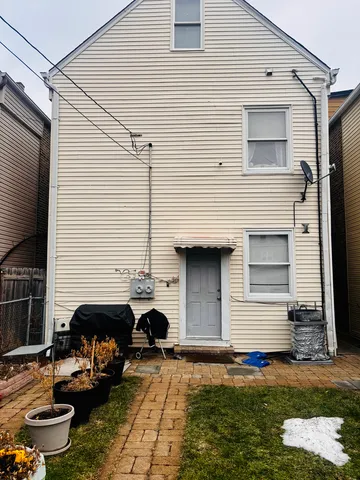a front view of a house with garage