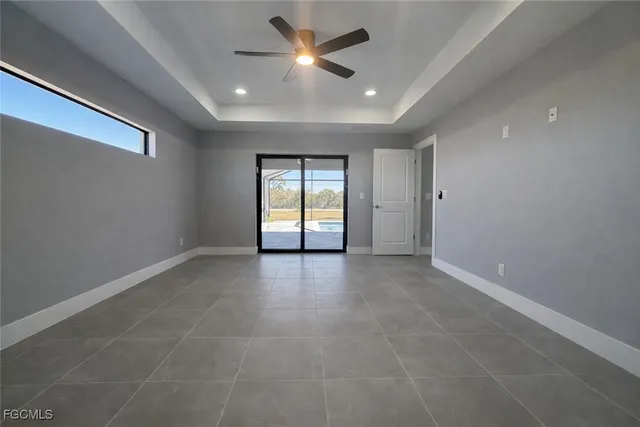 a bathroom with a granite countertop sink mirror and