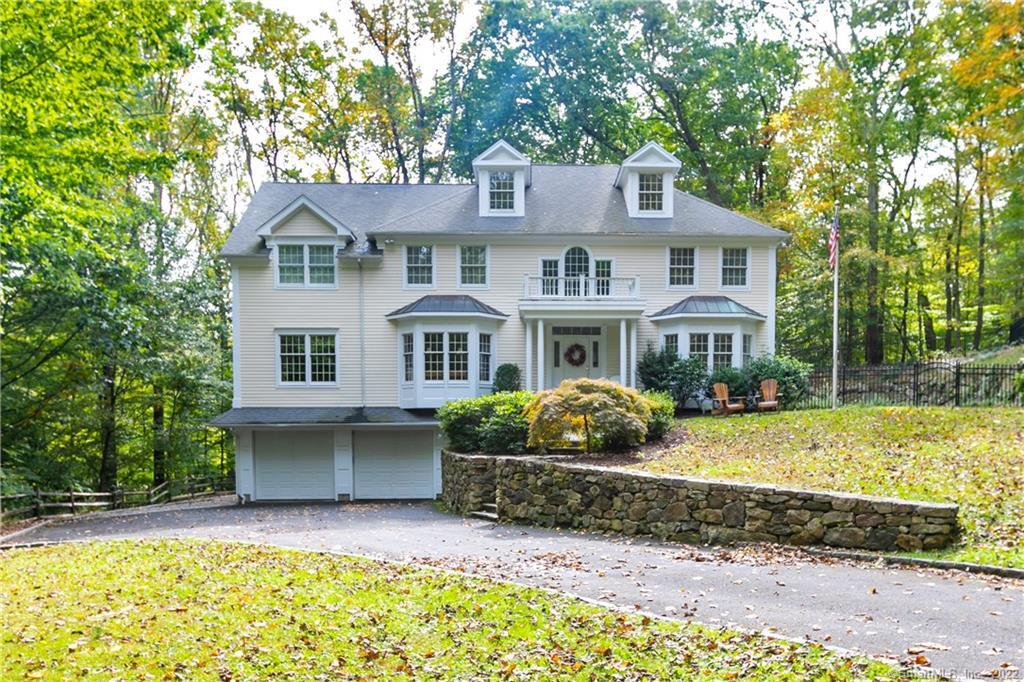 27 Coley Road Wilton, CT 06897 - Photo 1 of 1 a front view of a house with garden