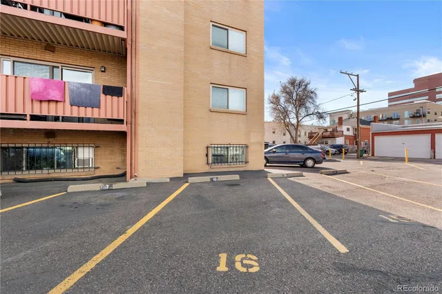 a car parked in front of a building