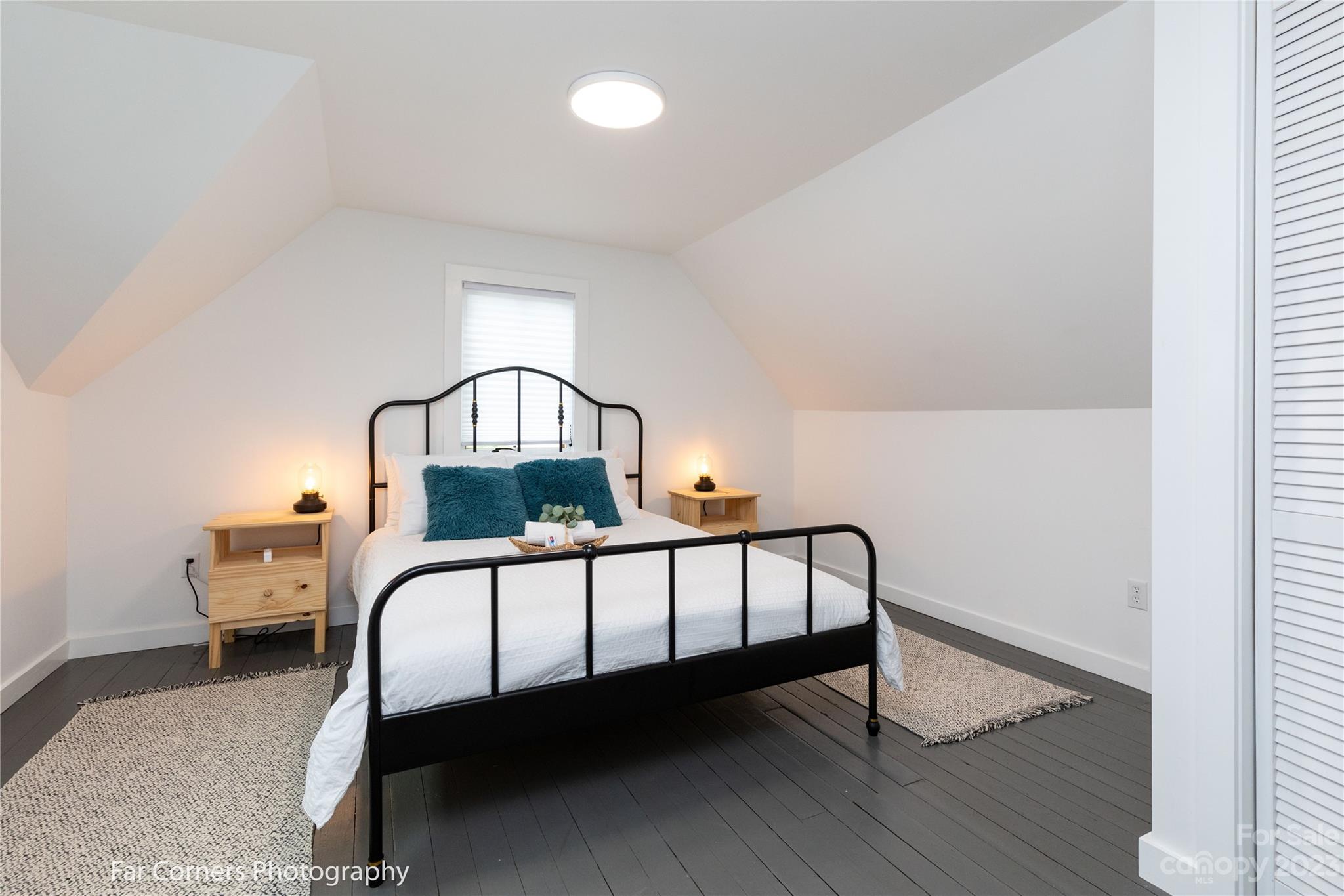 29 South School Road Marshall, NC 28753 - Photo 15 of 24 a view of a bedroom with furniture