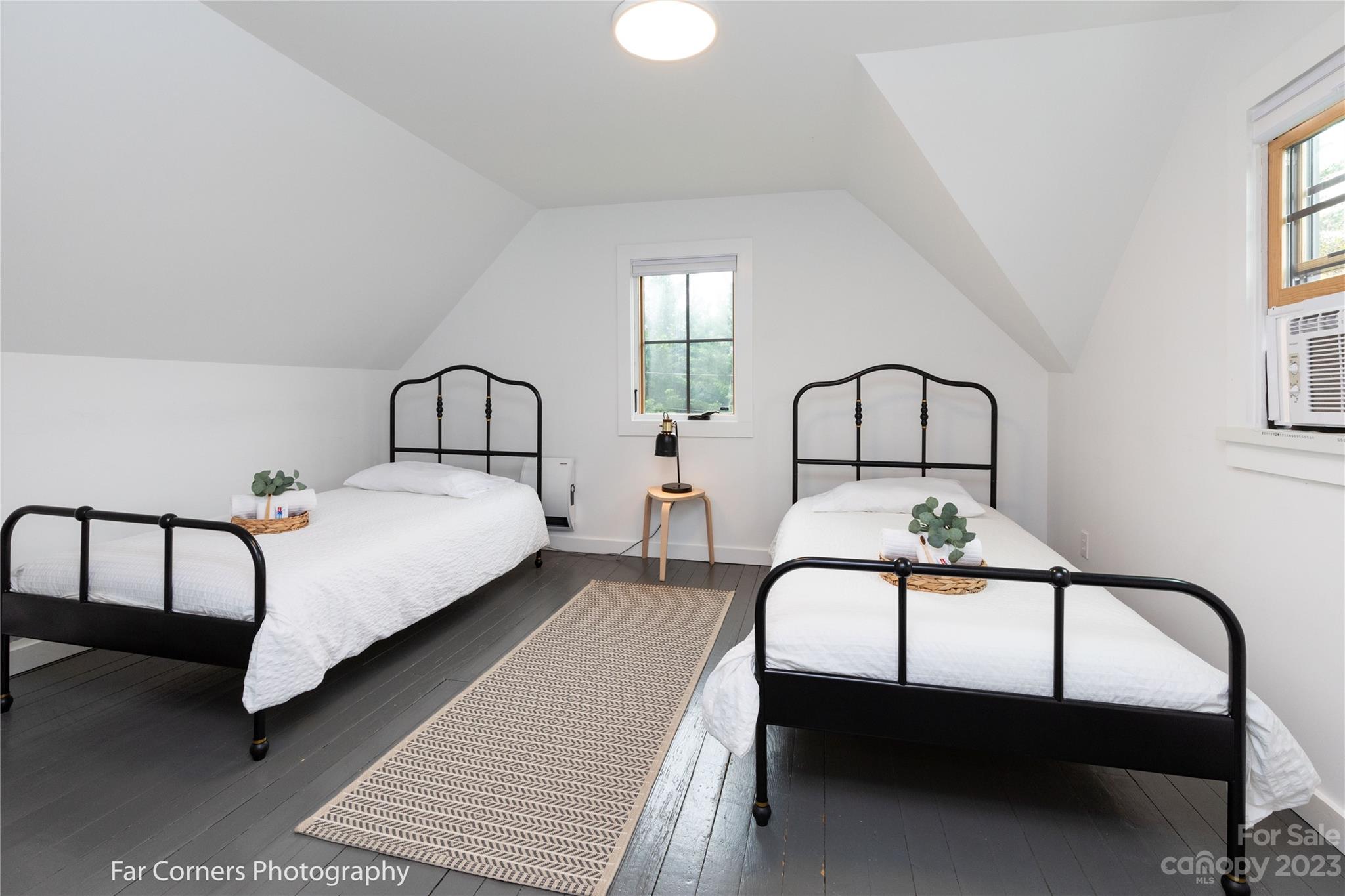 29 South School Road Marshall, NC 28753 - Photo 16 of 24 a bedroom with bed and a window