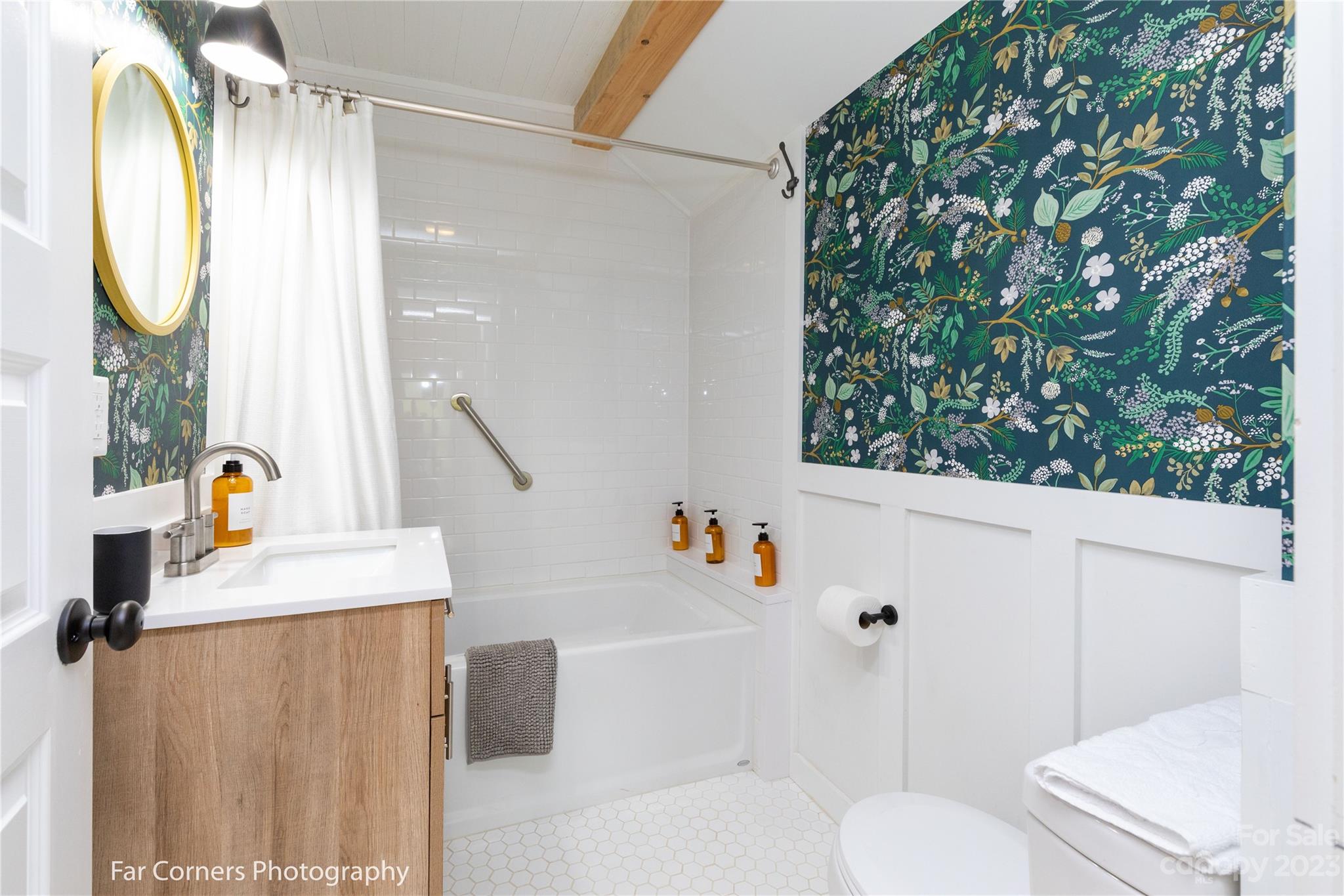 29 South School Road Marshall, NC 28753 - Photo 17 of 24 a bathroom with a sink toilet and a mirror