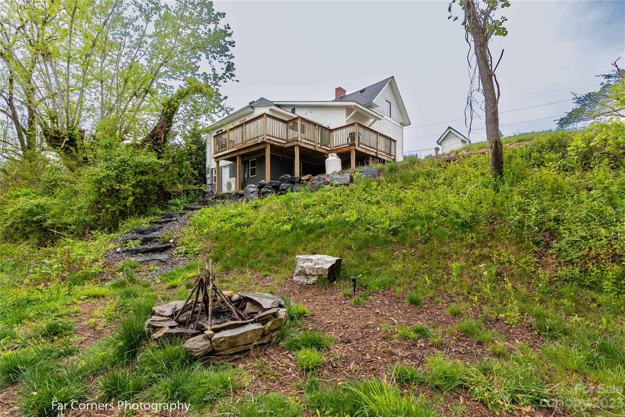 29 South School Road Marshall, NC 28753 - Photo 20 of 24 a front view of a house with a yard