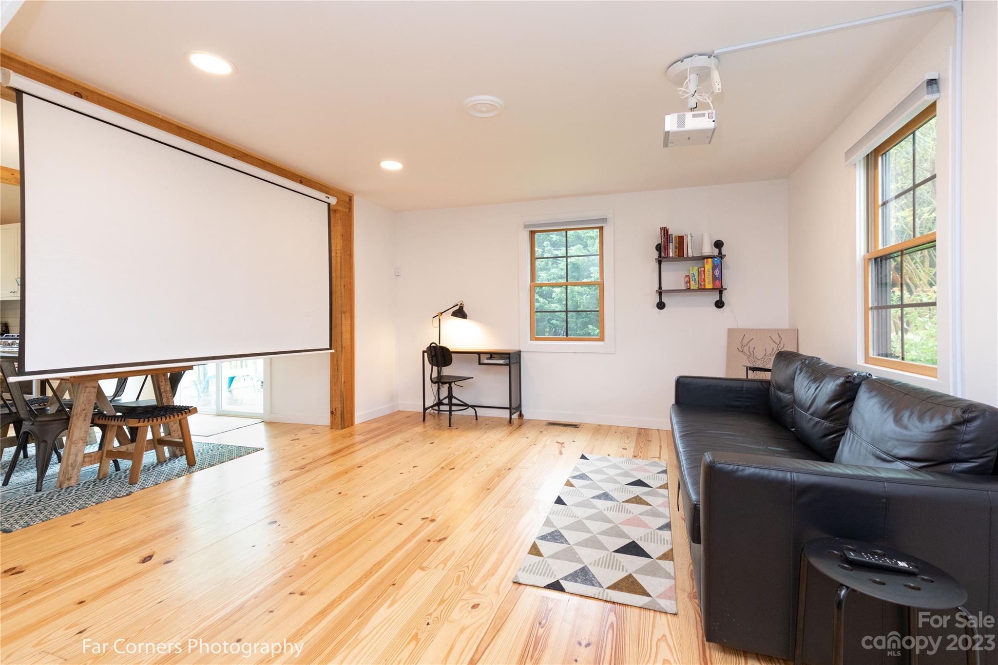 29 South School Road Marshall, NC 28753 - Photo 7 of 24 a living room with furniture and a flat screen tv