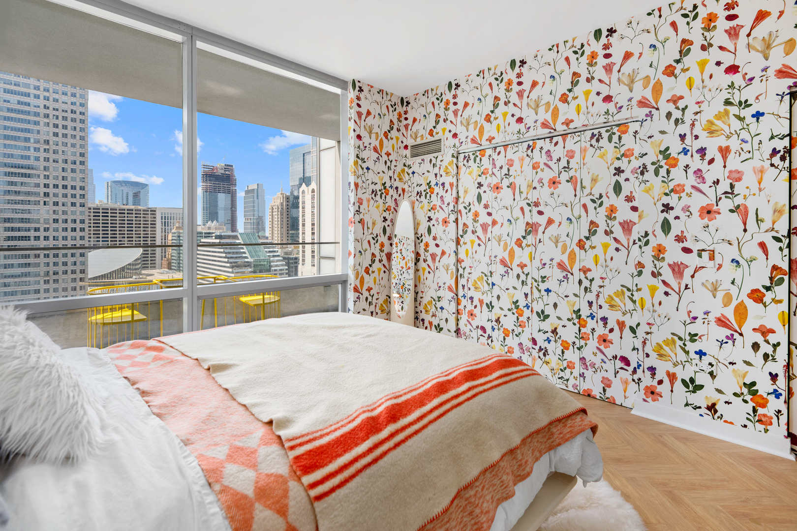 8 East Randolph Street, Unit 2906 Chicago, IL 60601 - Photo 11 of 13 a bed sitting in a room next to a window