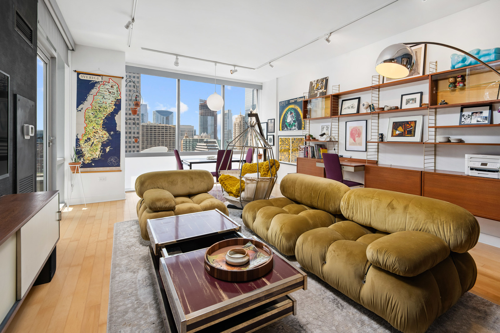 8 East Randolph Street, Unit 2906 Chicago, IL 60601 - Photo 2 of 13 a living room with furniture and a window