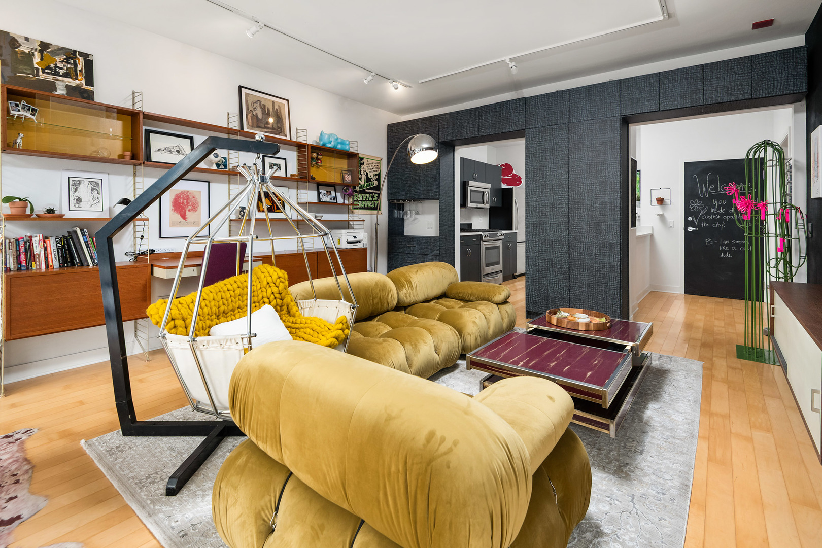 8 East Randolph Street, Unit 2906 Chicago, IL 60601 - Photo 5 of 13 a living room with furniture and a flat screen tv