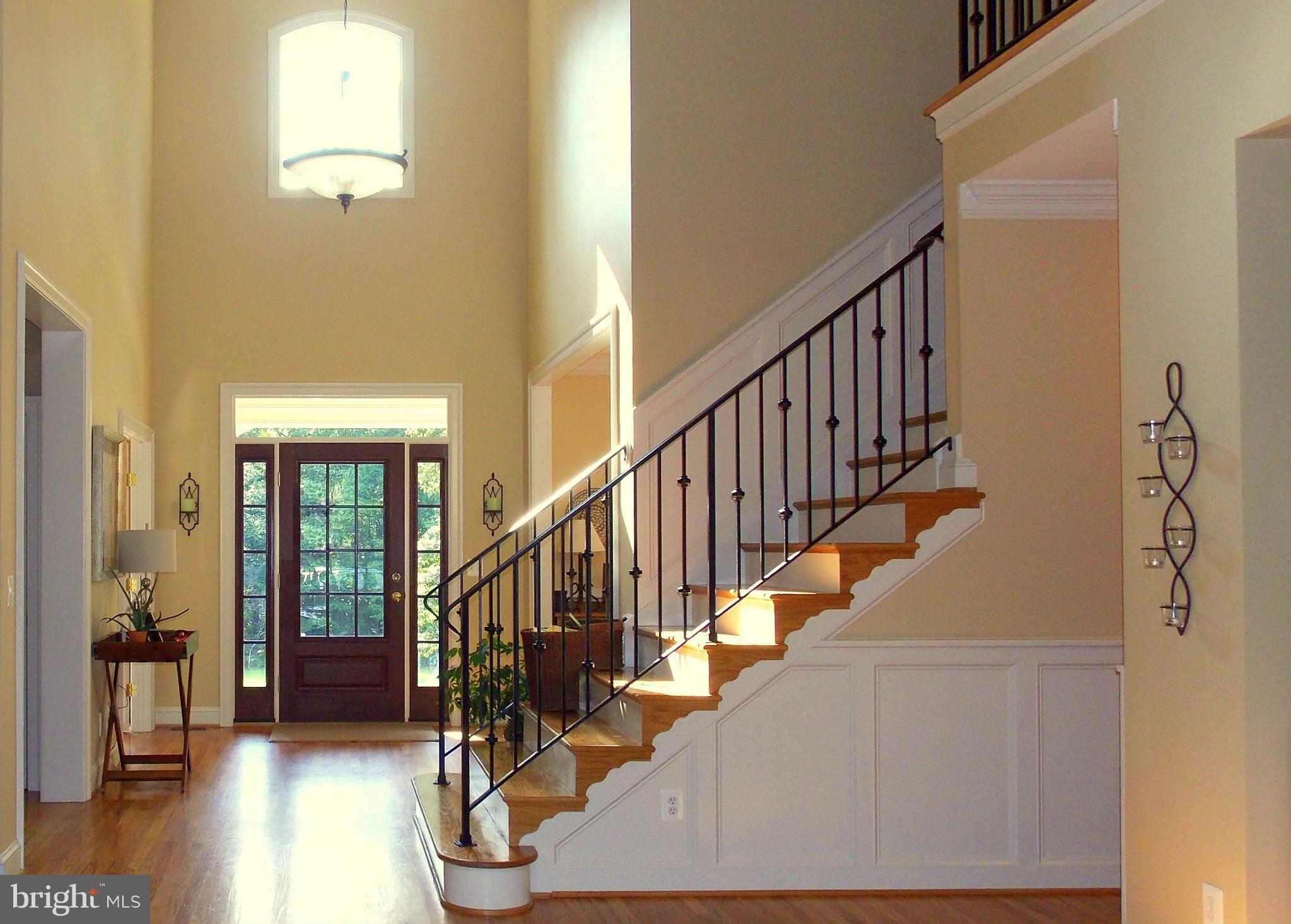 9587 Ada Road Marshall, VA 20115 - Photo 3 of 30 2-Story Foyer Leading to Family Room