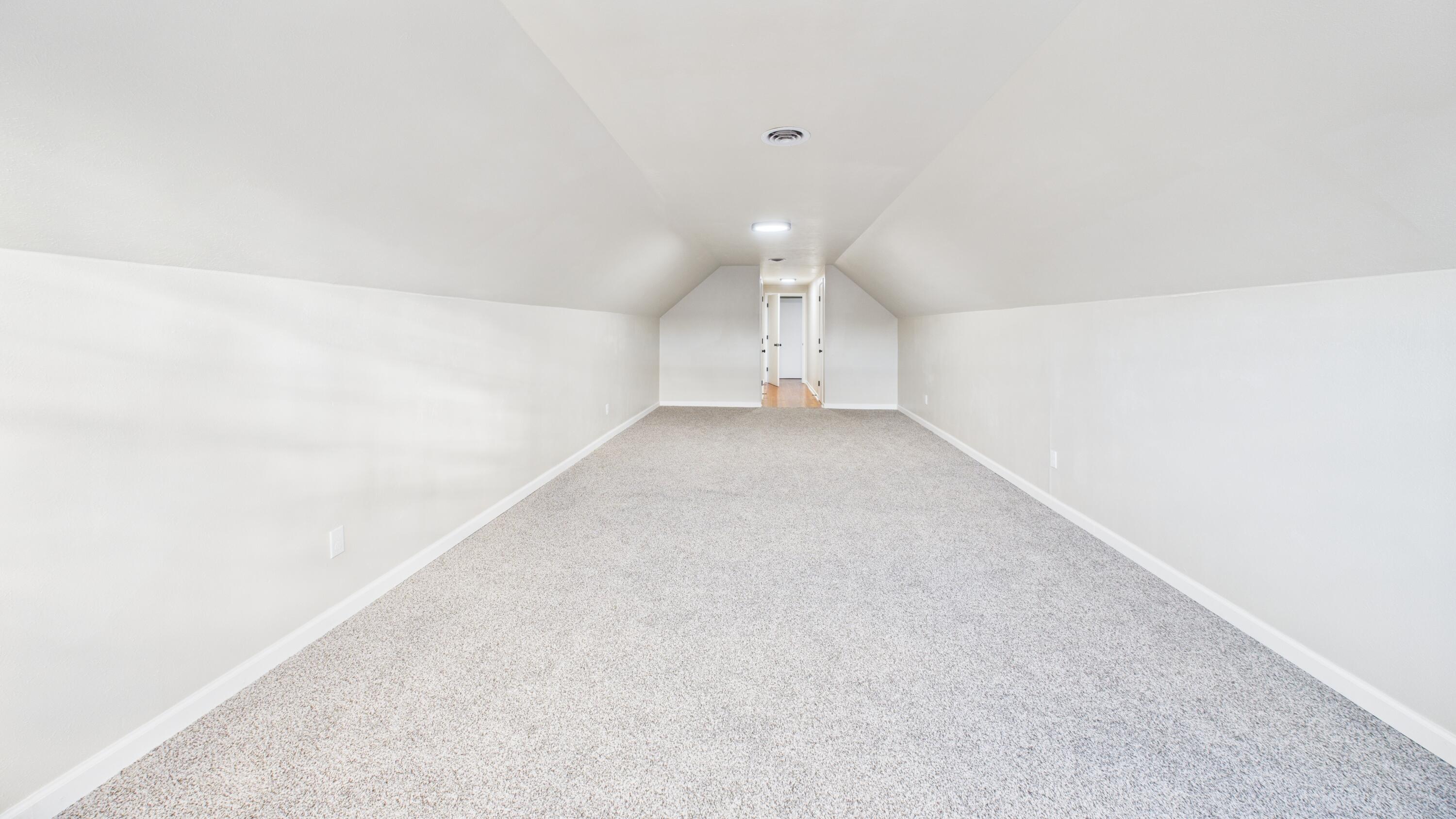 2013 69th Street Lubbock, TX 79412 - Photo 12 of 19 a view of a big room with windows