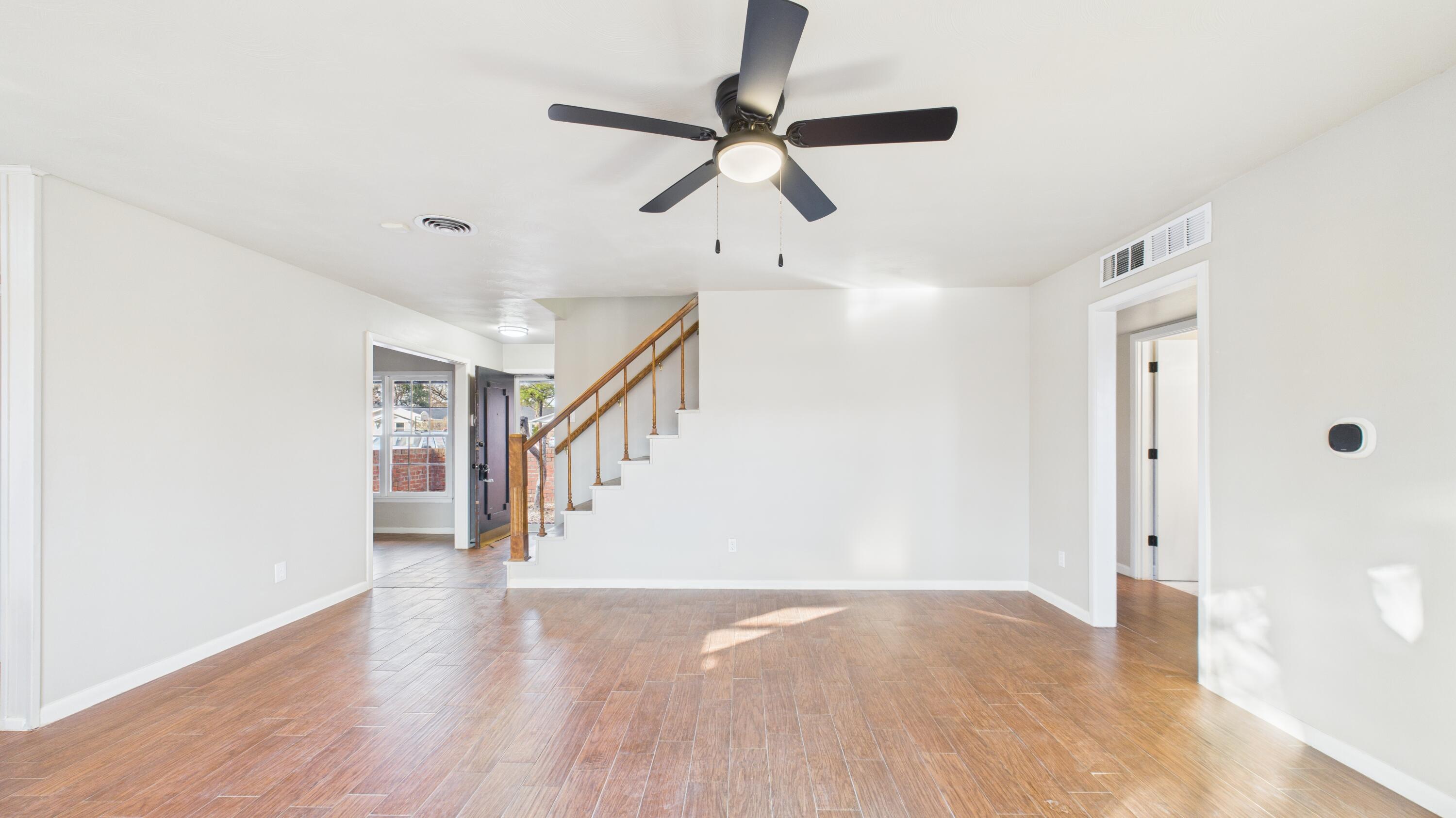 2013 69th Street Lubbock, TX 79412 - Photo 10 of 19 a view of entryway and hall with wooden floor