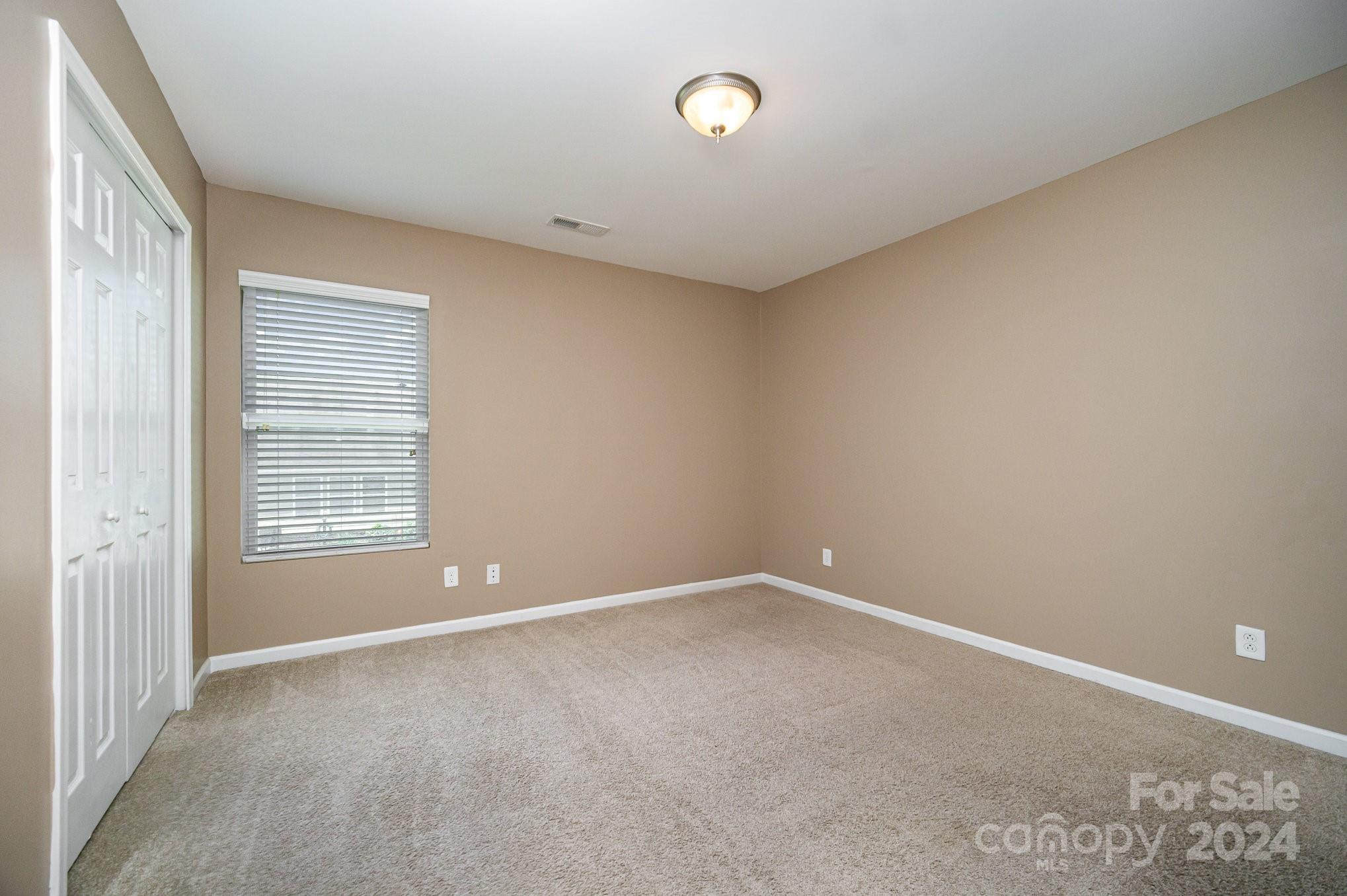 1007 Yellow Bee Road Indian Trail, NC 28079 - Photo 14 of 21 a view of an empty room with a window