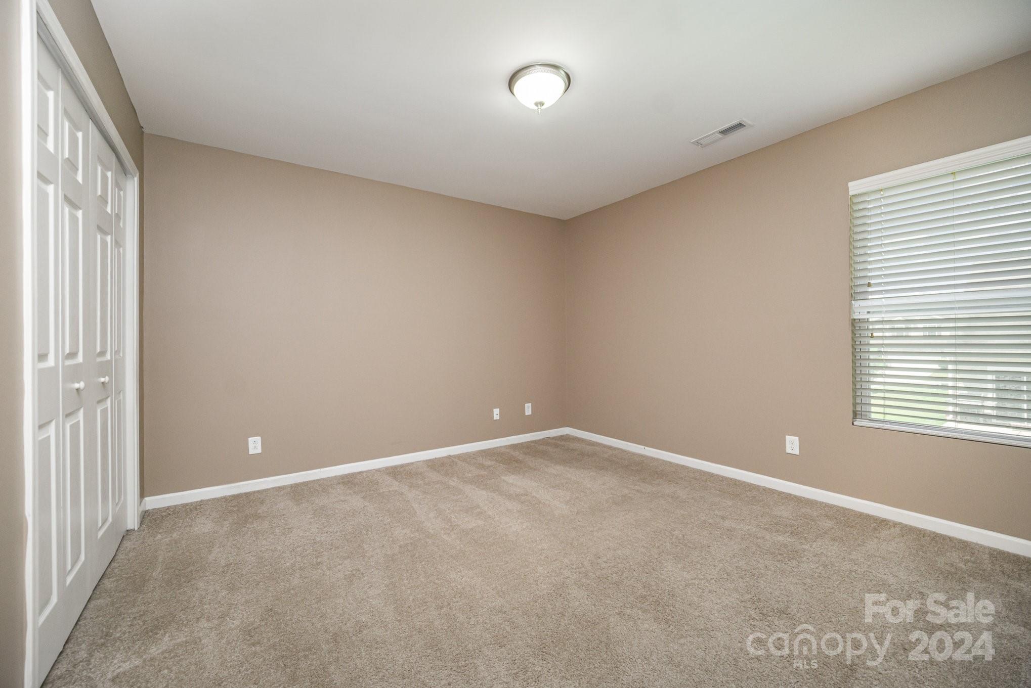 1007 Yellow Bee Road Indian Trail, NC 28079 - Photo 15 of 21 a view of an empty room with a window