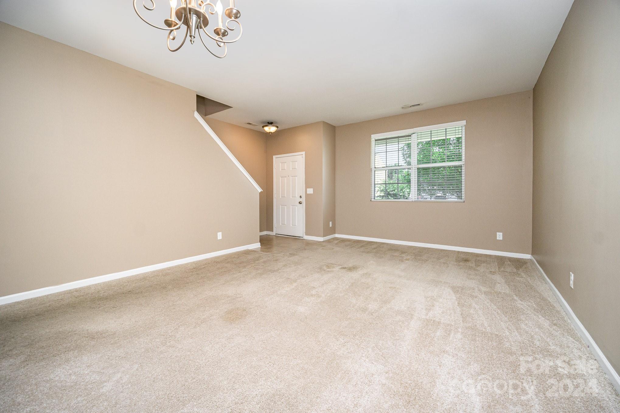 1007 Yellow Bee Road Indian Trail, NC 28079 - Photo 3 of 21 an empty room with windows