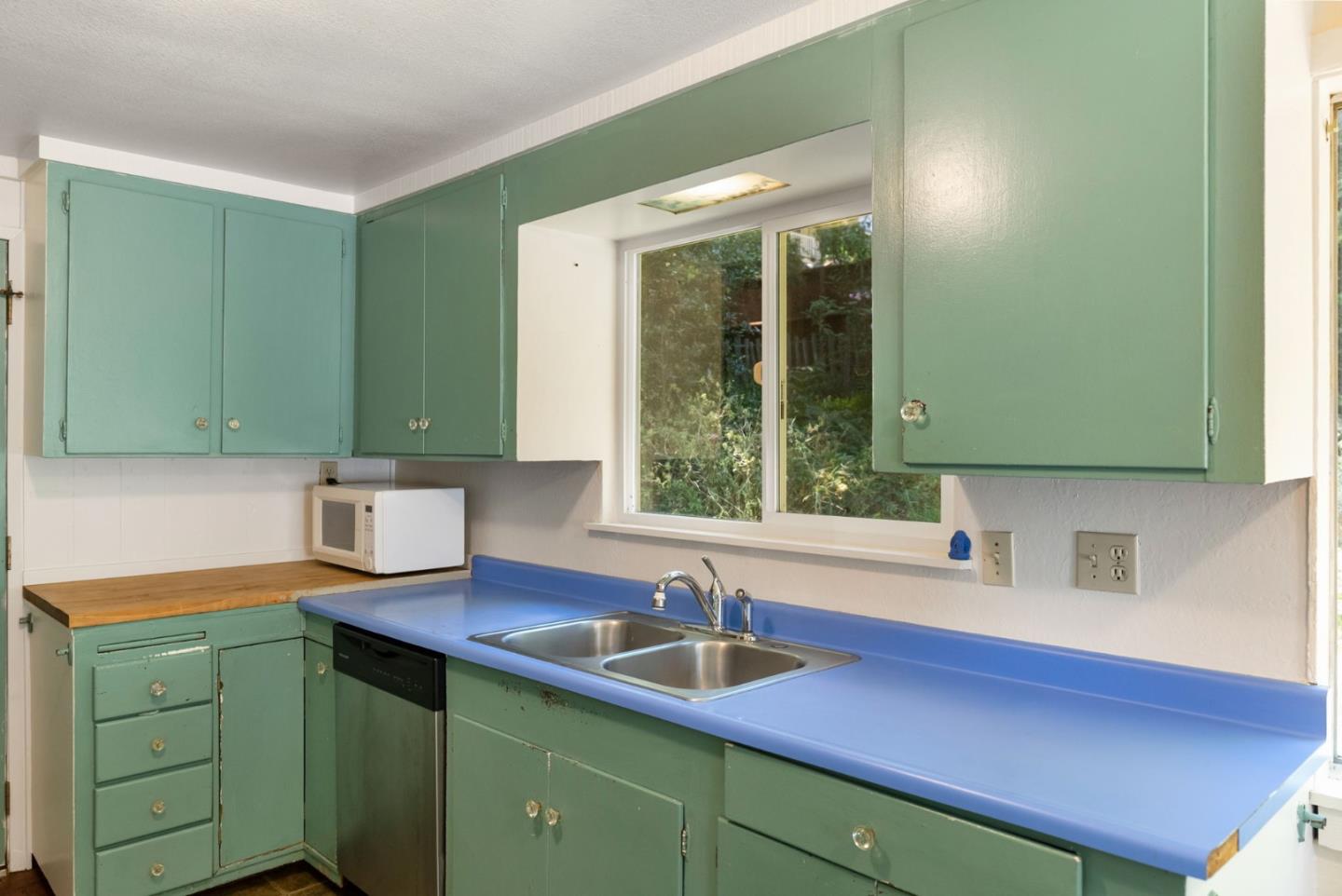 324 Felton Empire Road Felton, CA 95018 - Photo 18 of 43 a kitchen with a sink cabinets and window