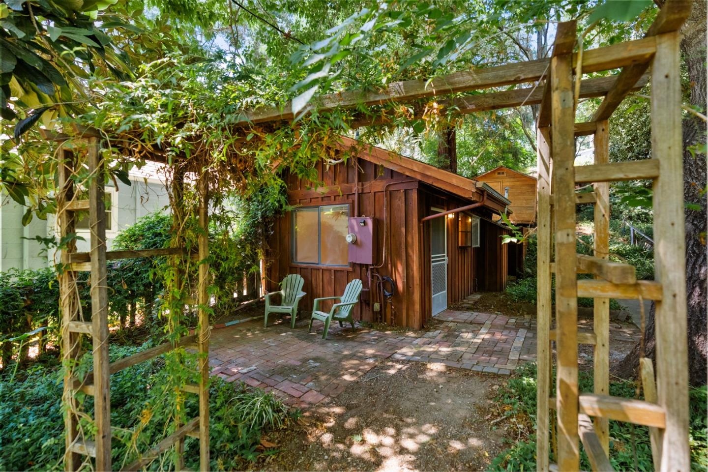 324 Felton Empire Road Felton, CA 95018 - Photo 27 of 43 a view of a small house in the middle of a yard