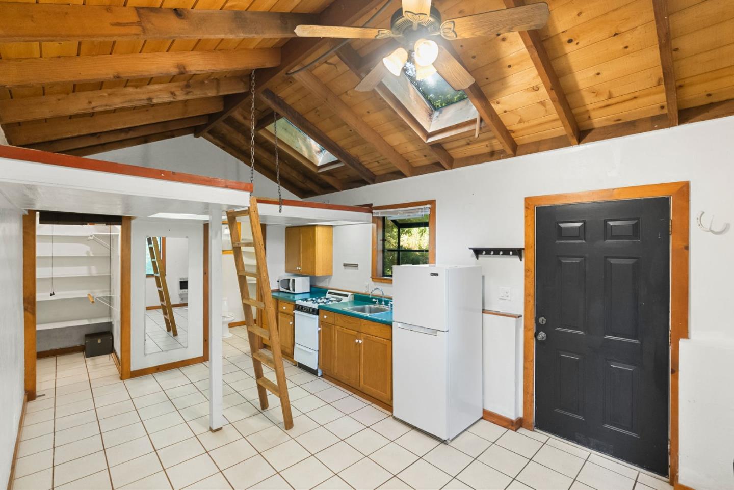 324 Felton Empire Road Felton, CA 95018 - Photo 30 of 43 a view of a hallway with wooden cabinets
