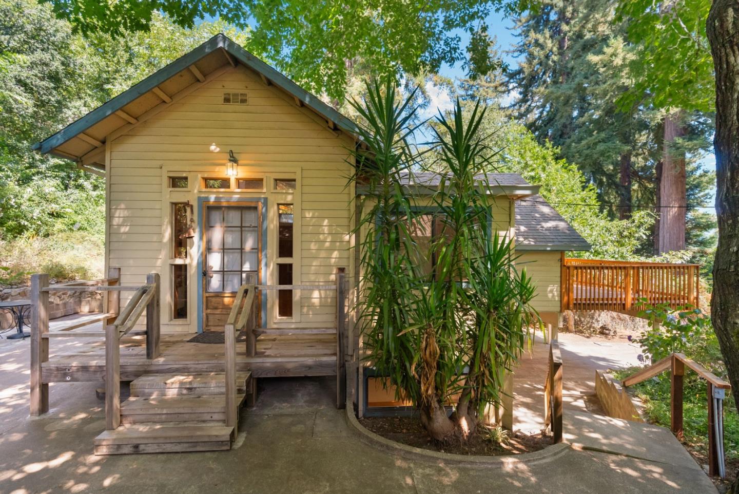 324 Felton Empire Road Felton, CA 95018 - Photo 3 of 43 a front view of a house with garden